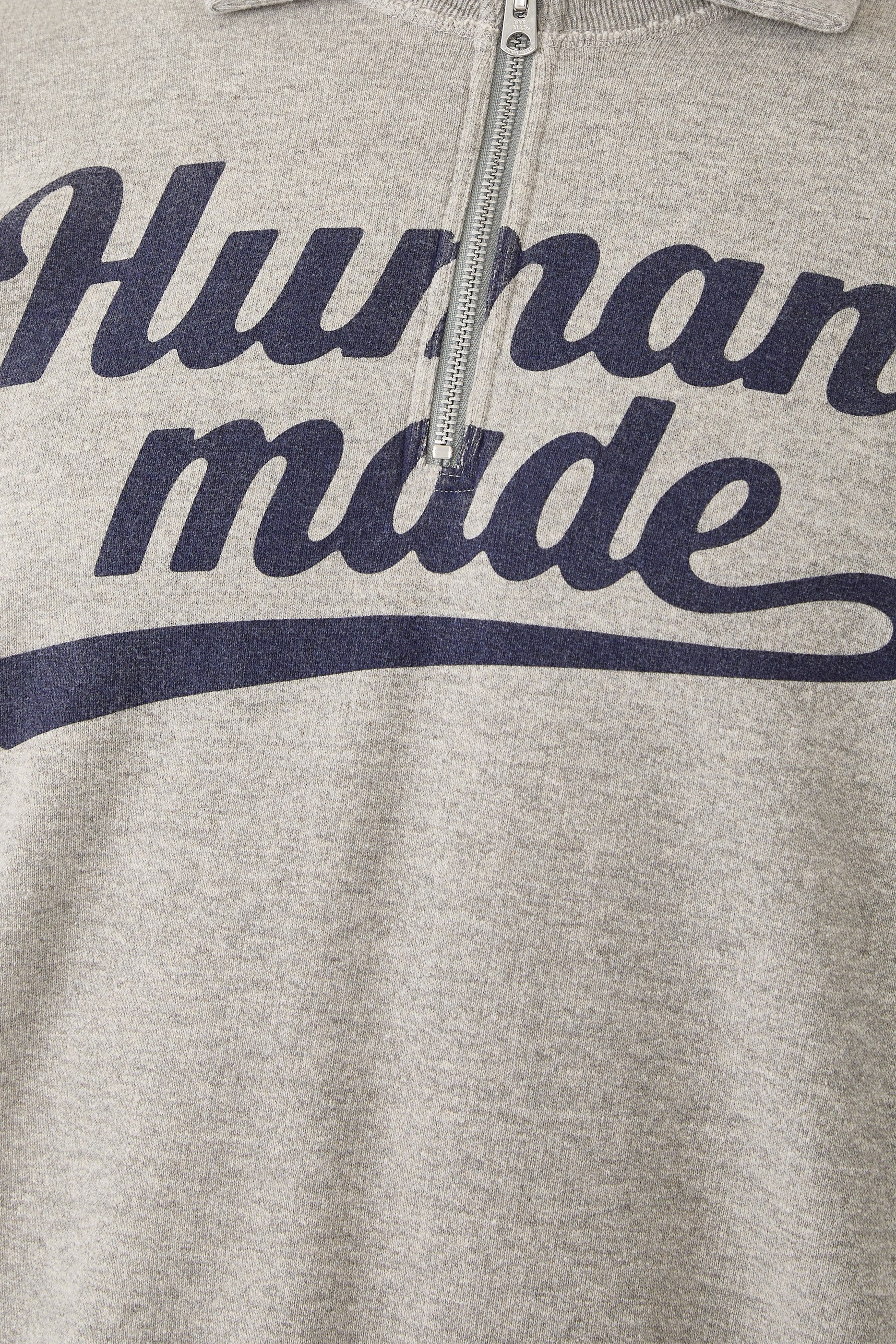 سويت شيرت بنصف سحاب وشعار الماركة