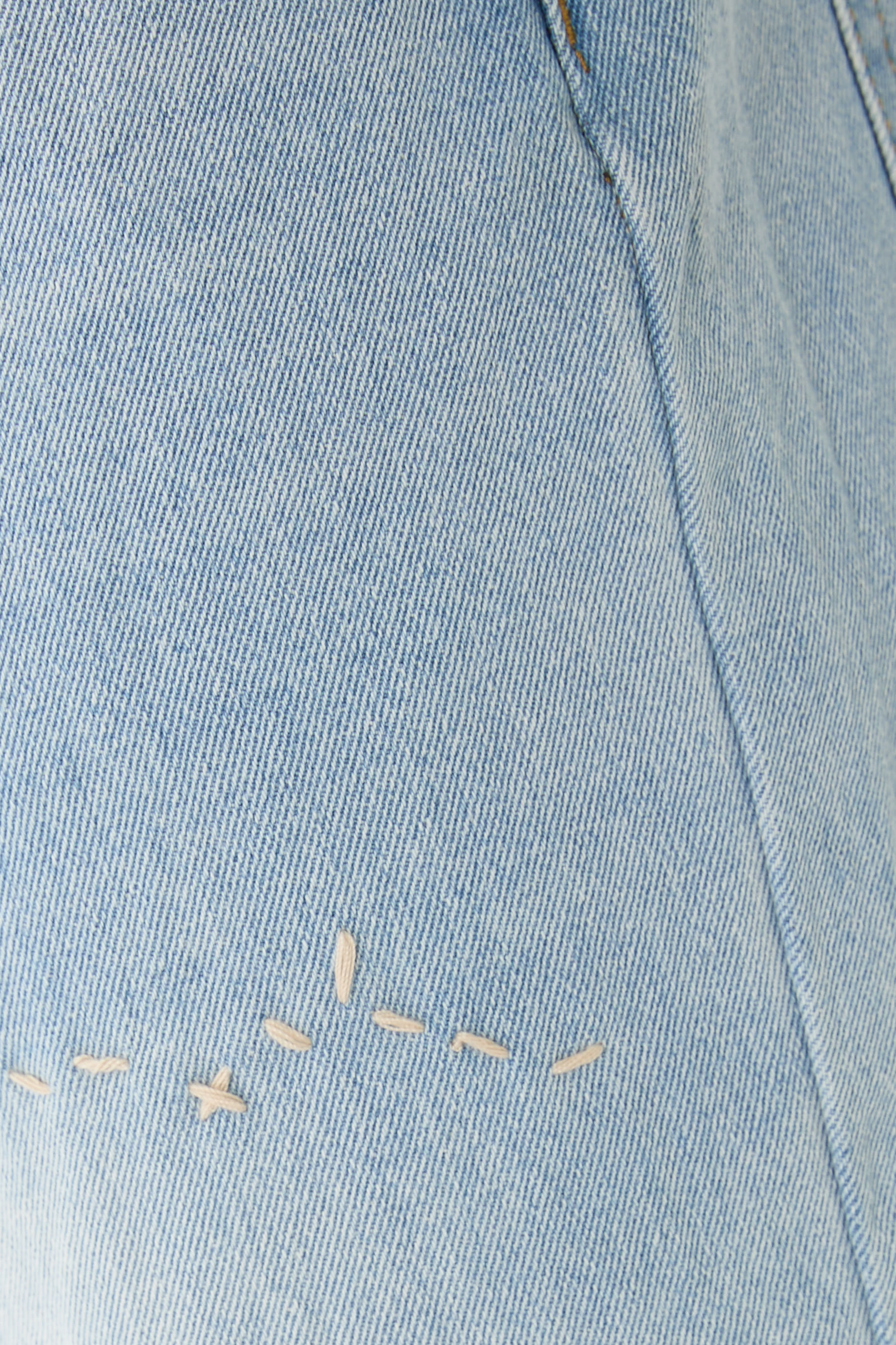 بنطال جينز جيرك بحافة واسعة