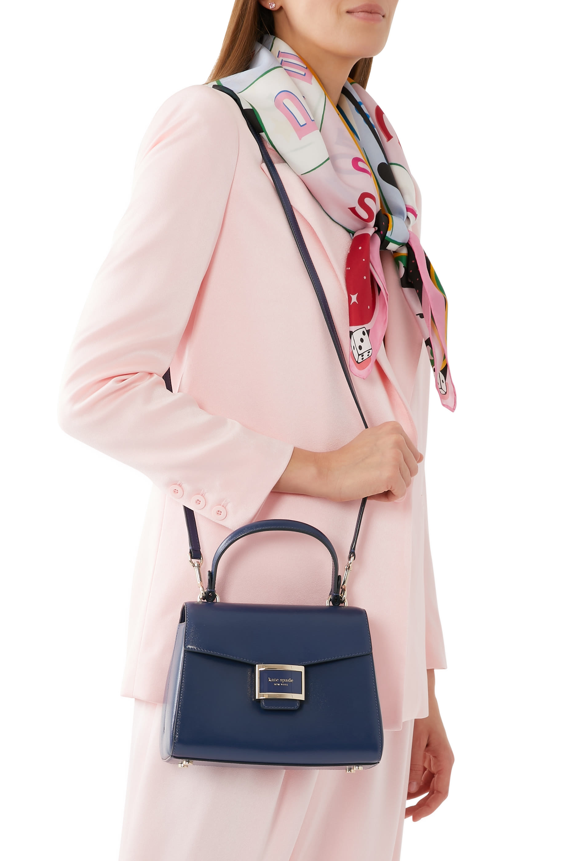 حقيبة كاتي صغيرة بيد علوية جلد لامع