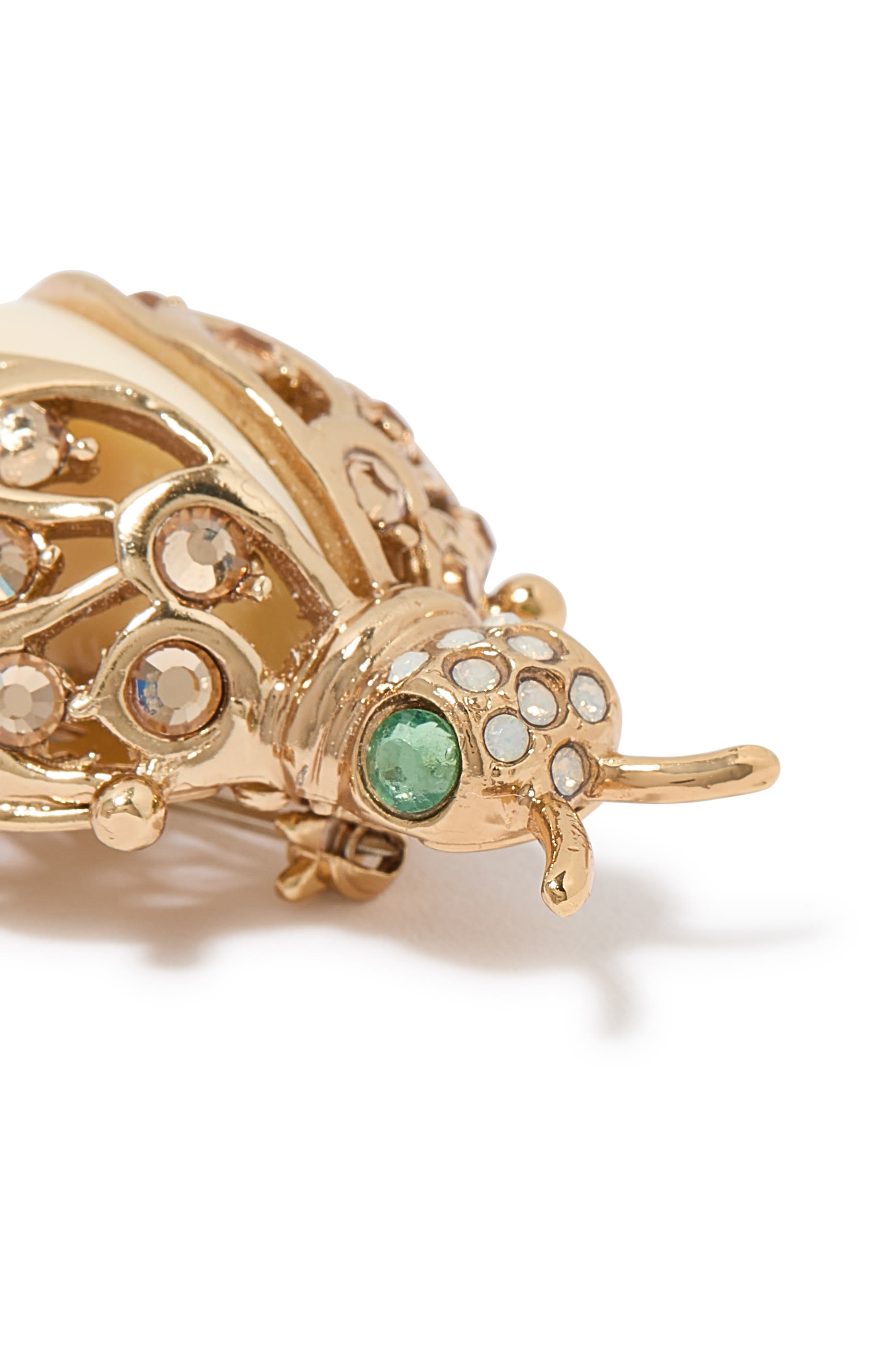 بروش كوكسينيل، نحاس مطلي بالذهب