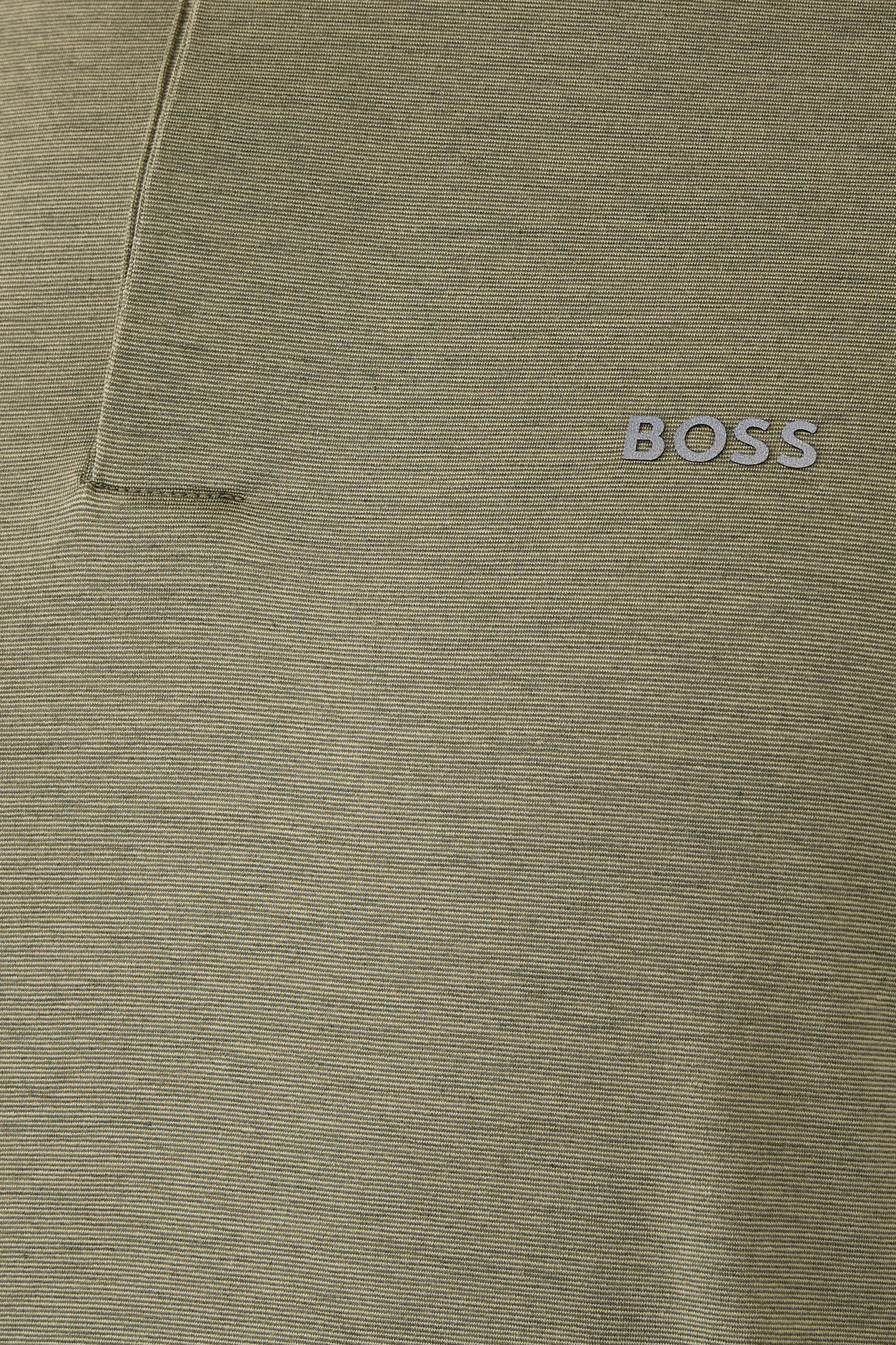 قميص بولو بقصة ضيقة بخاصية تنظيم درجة الحرارة