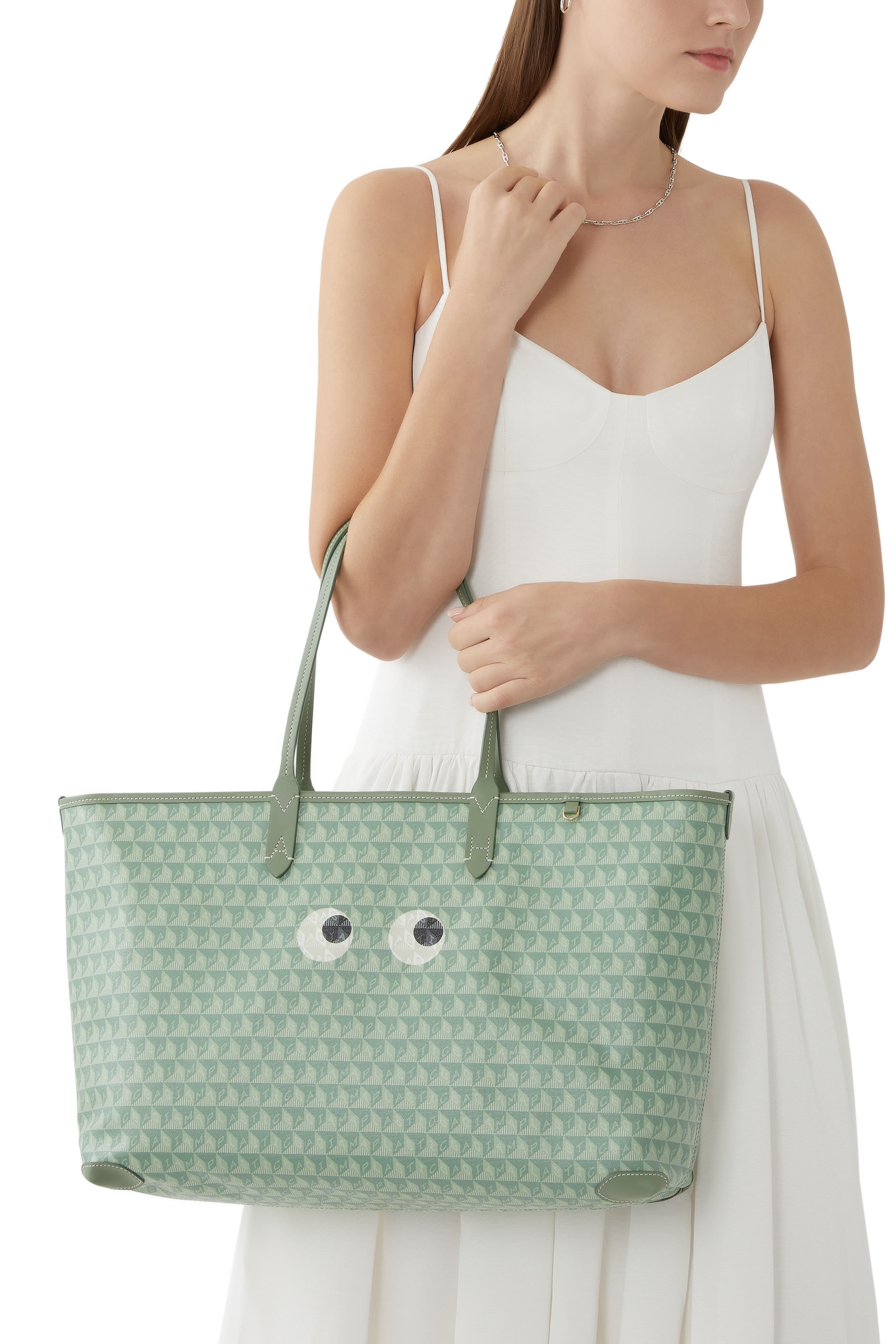 حقيبة يد آي ام ايه بلاستيك باج بسحاب مزينة بعيون