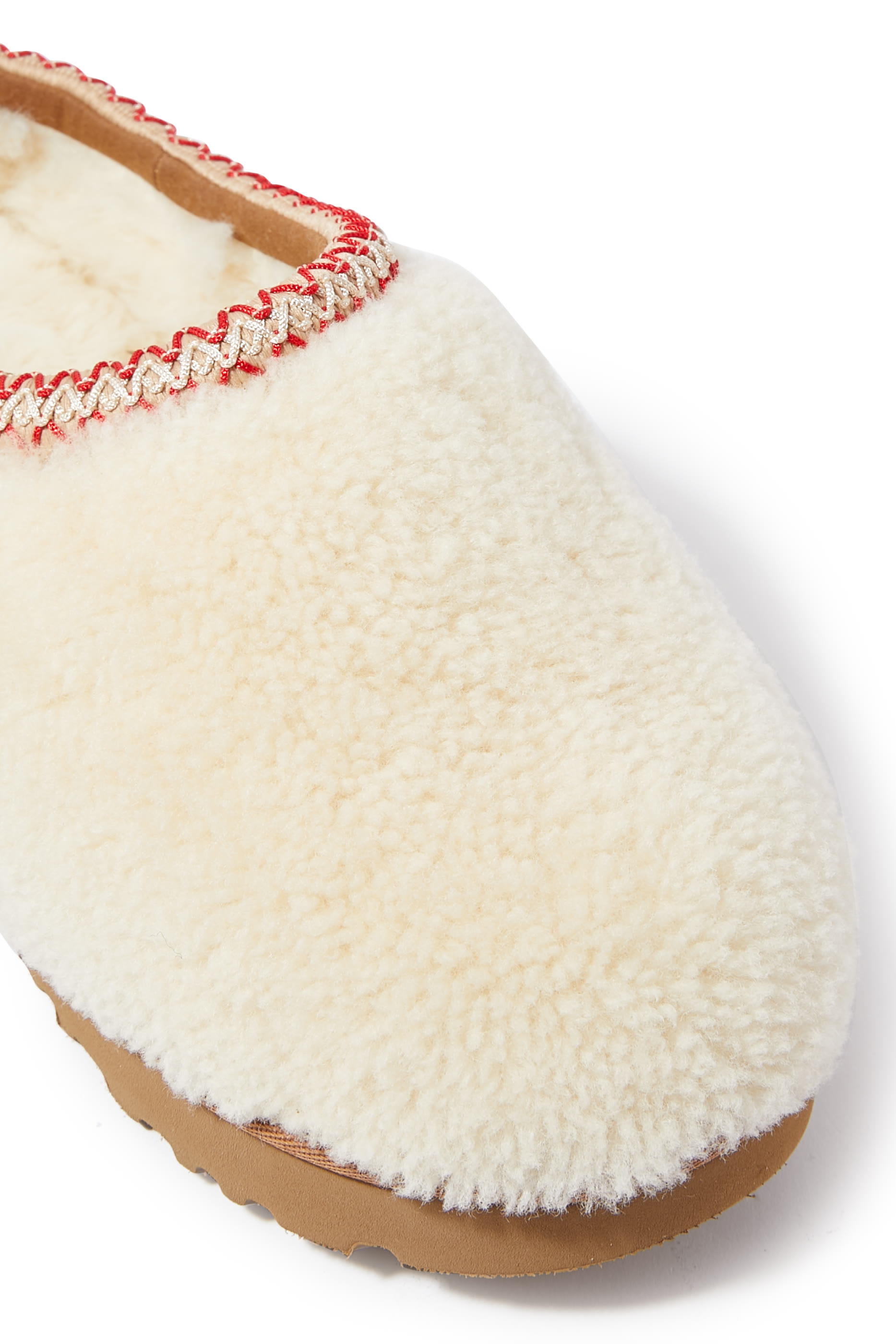 حذاء تاسمان مفتوح من الخلف بنعل سميك جلد غنم مجعد