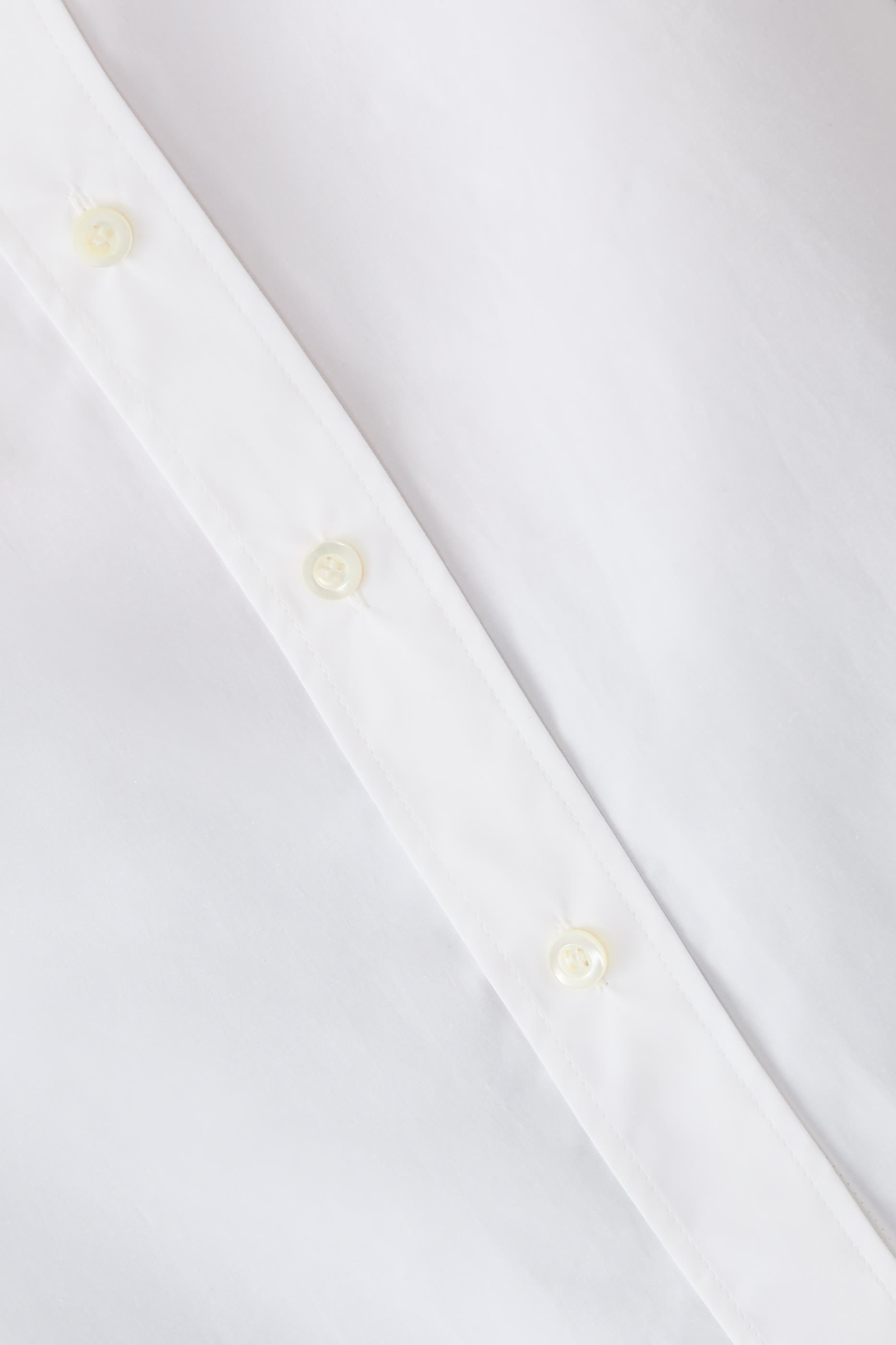 قميص بقصة فضفاضة