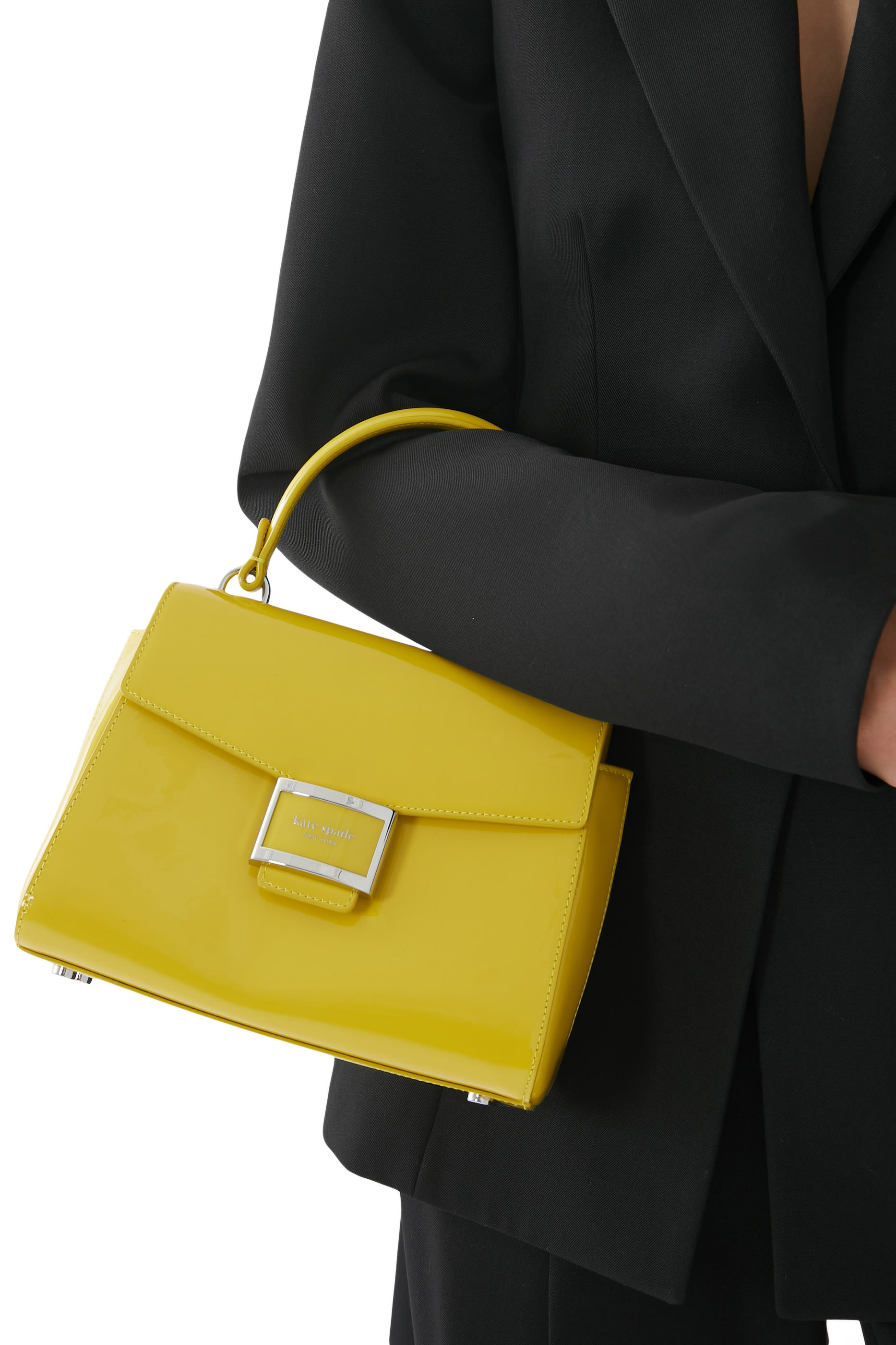 حقيبة كاتي صغيرة بيد علوية جلد لامع