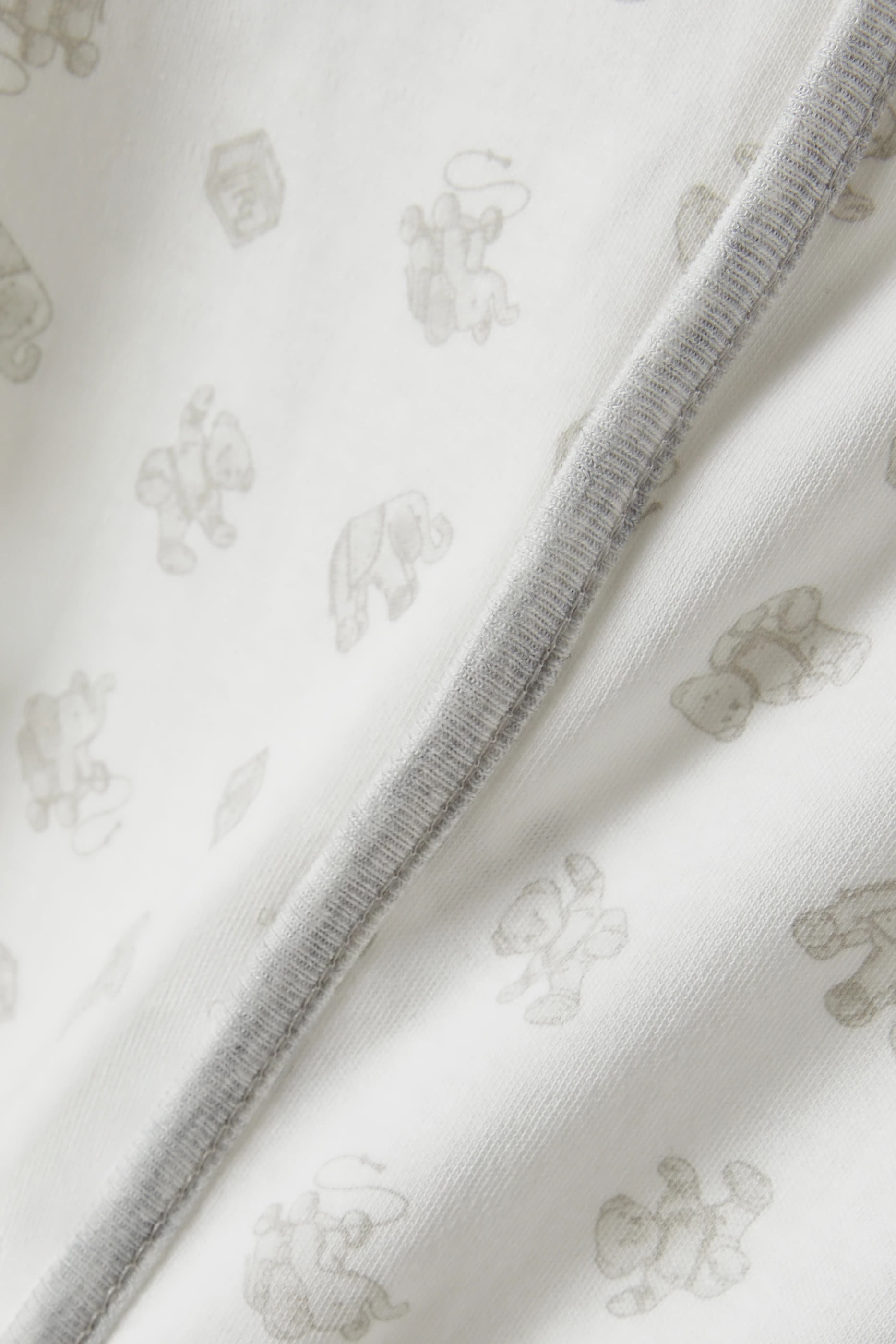 لباس قطعة واحدة بقدمين وطبعة الدب بولو للأطفال