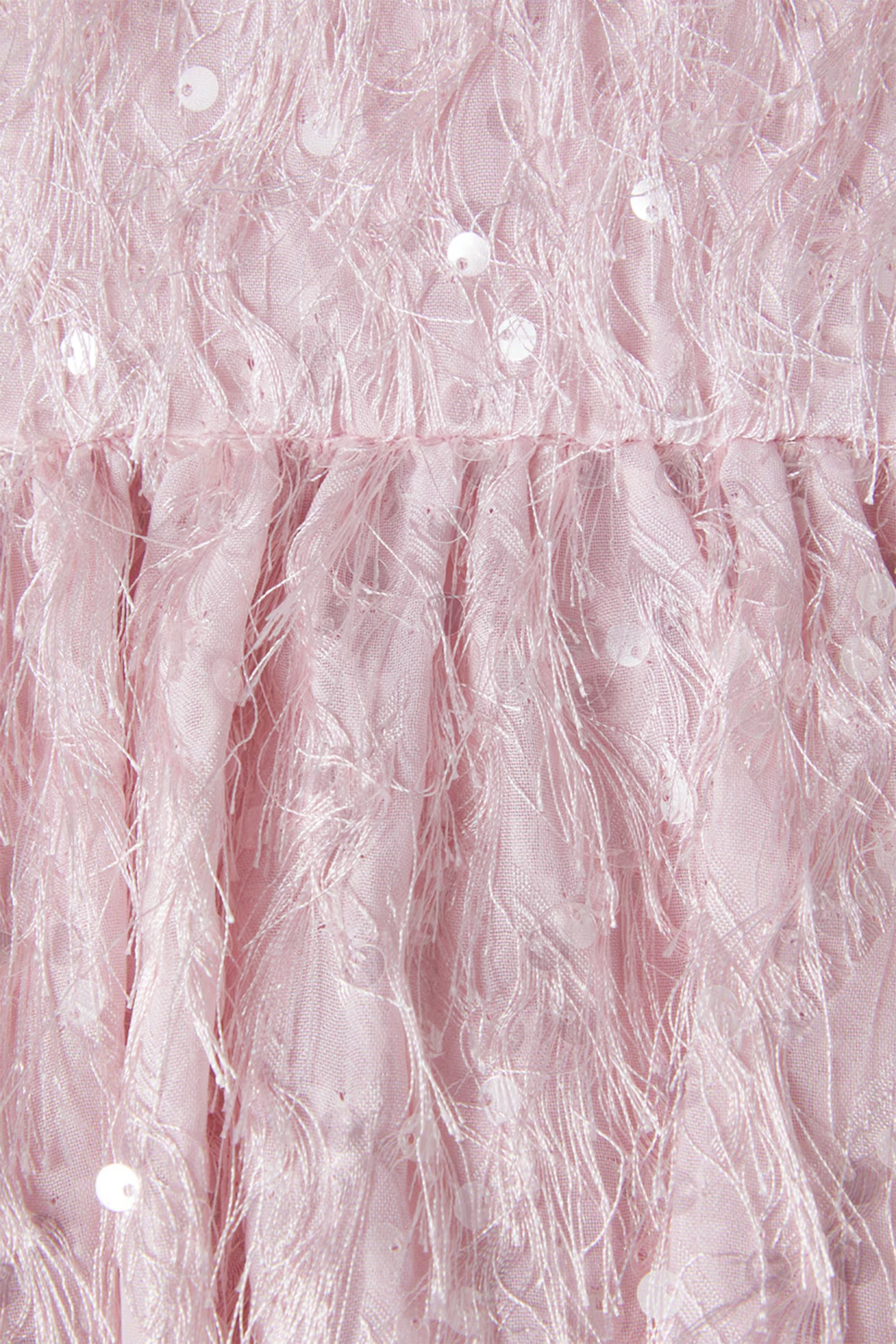 تنورة مزينة بترتر وريش للأطفال