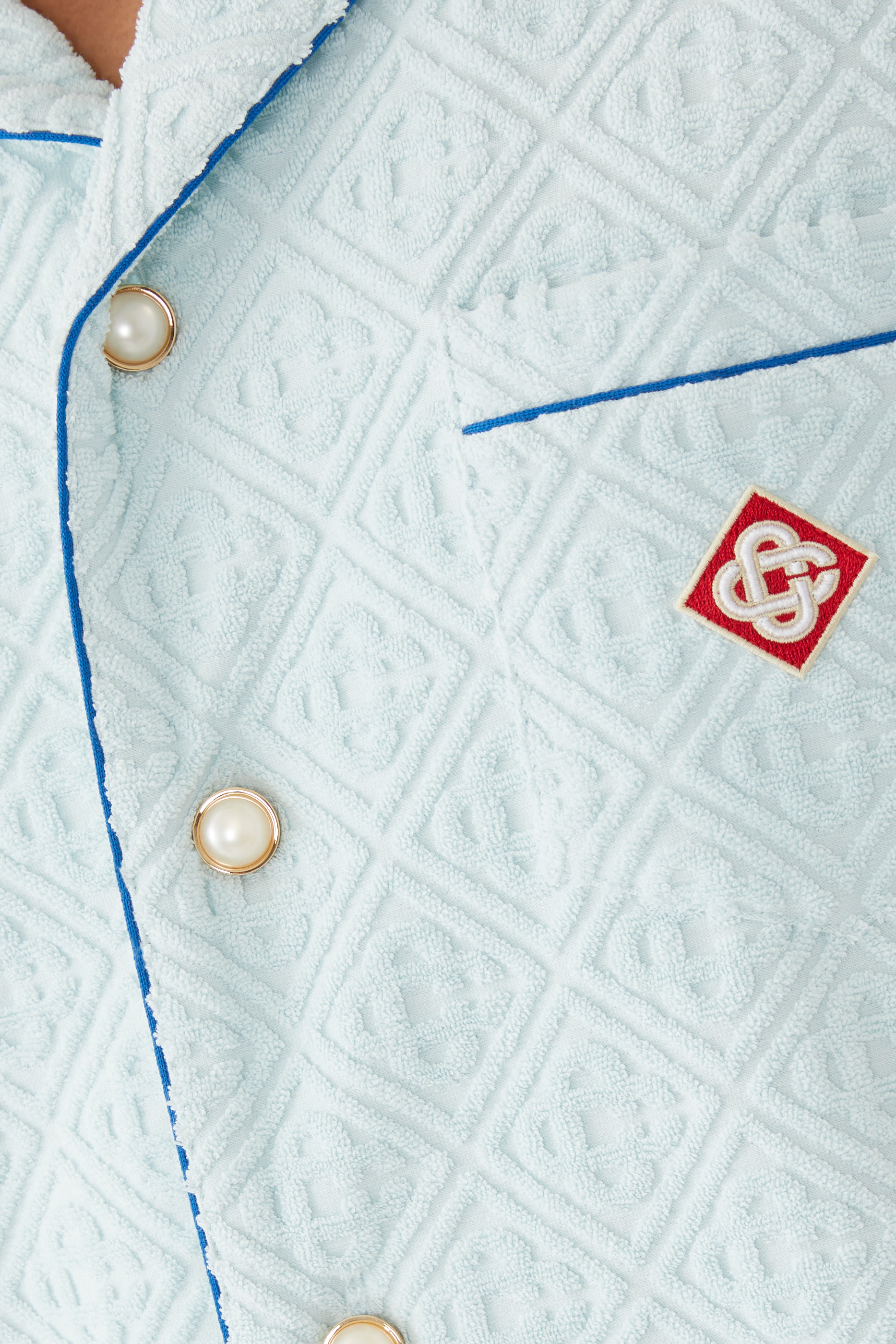 قميص بشعار الماركة قماش تيري