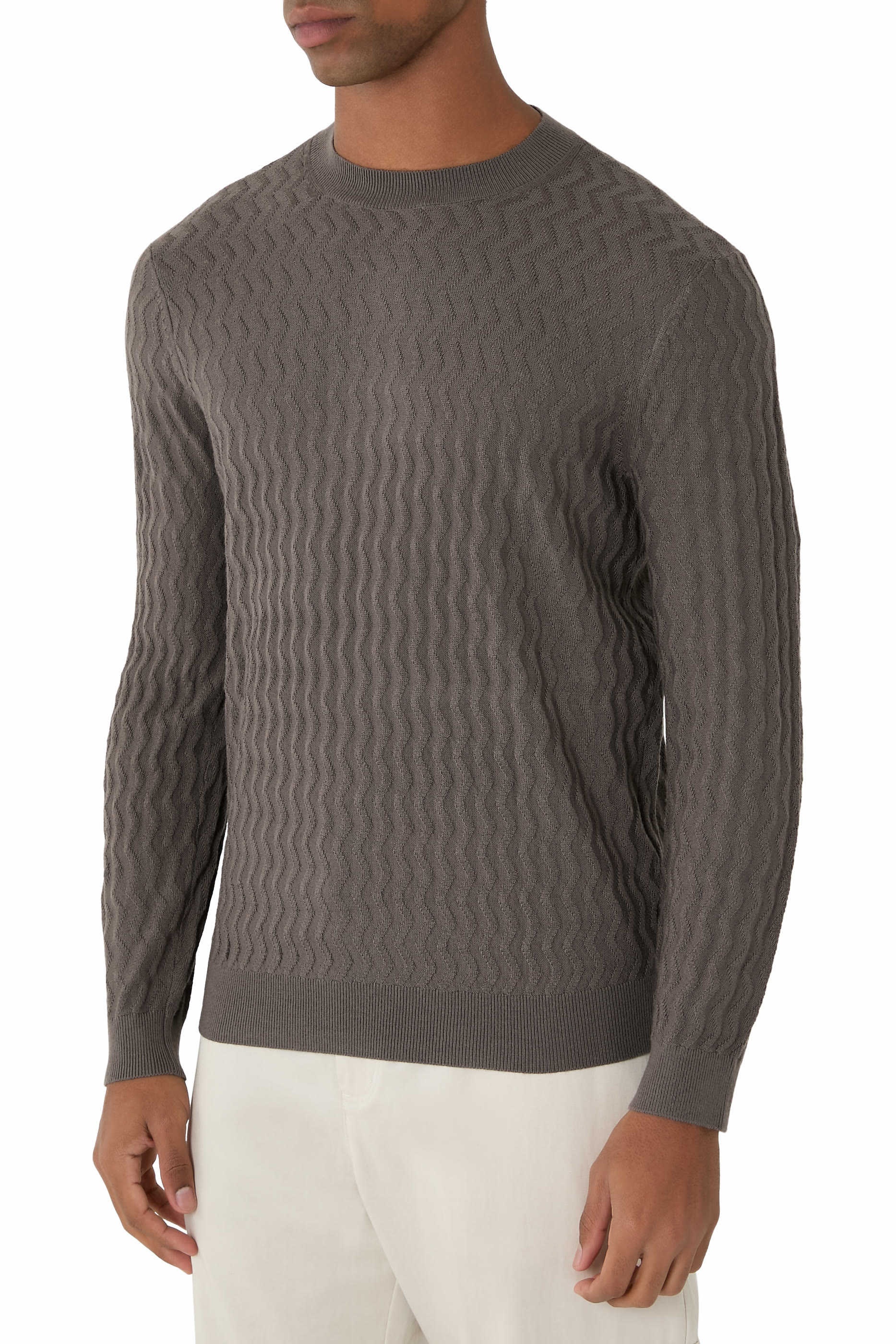 كنزة بتصميم متموج بارزة الملمس