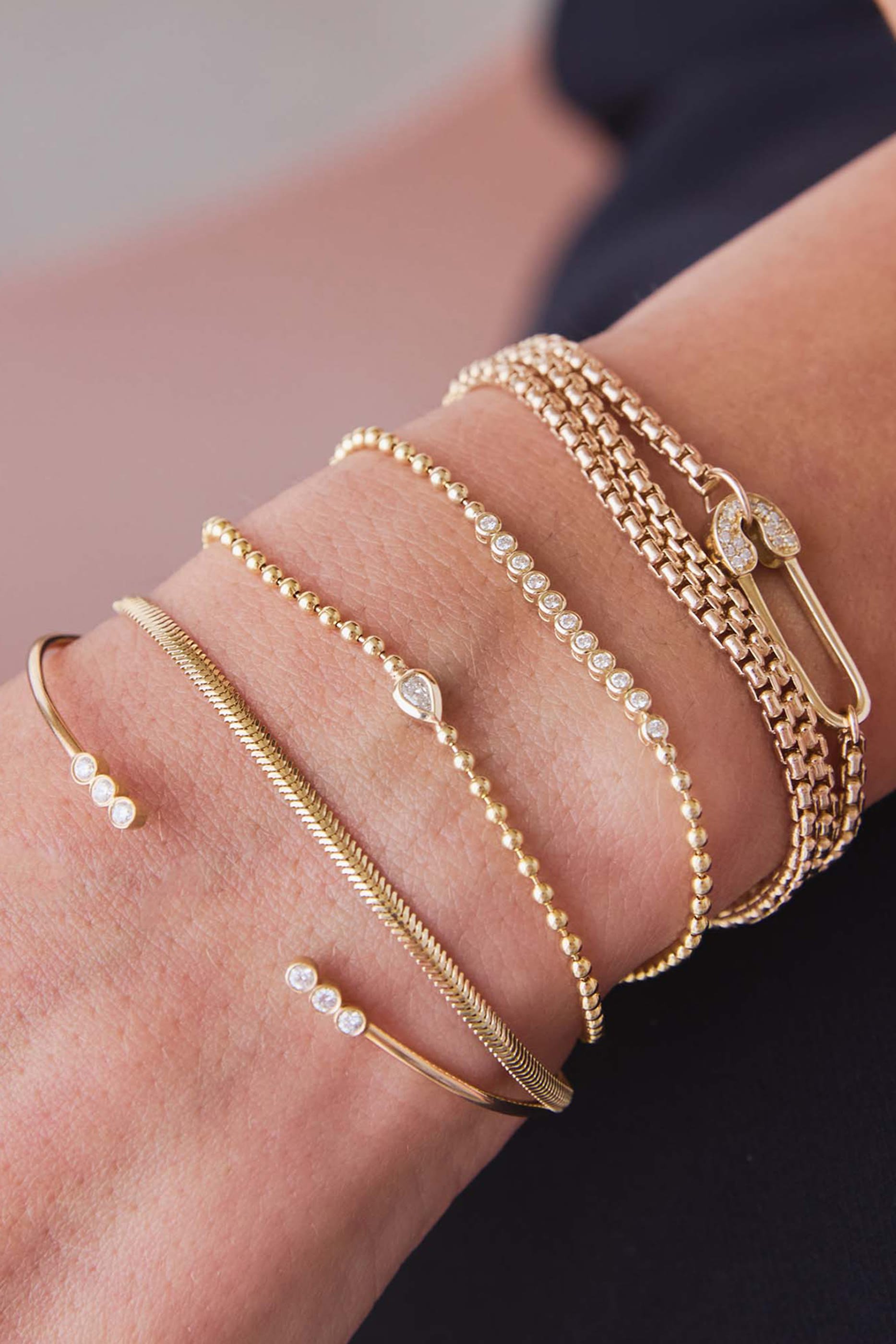 سوار صغير بتصميم سلسلة مستوحاة من جسم الأفعى، ذهب أصفر عيار 14