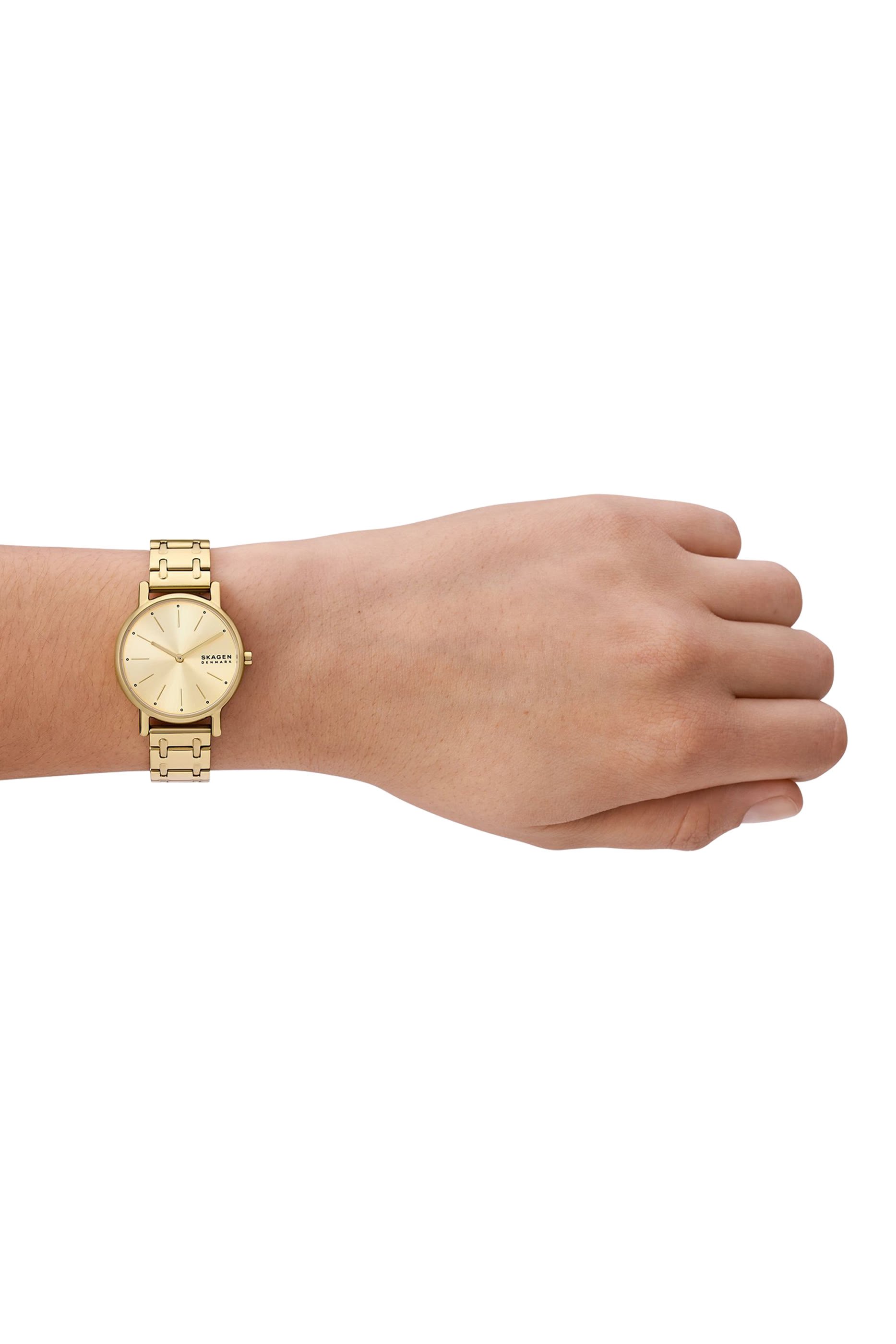 ساعة ليل بعقربان وشعار الماركة وسوار ستانلس ستيل