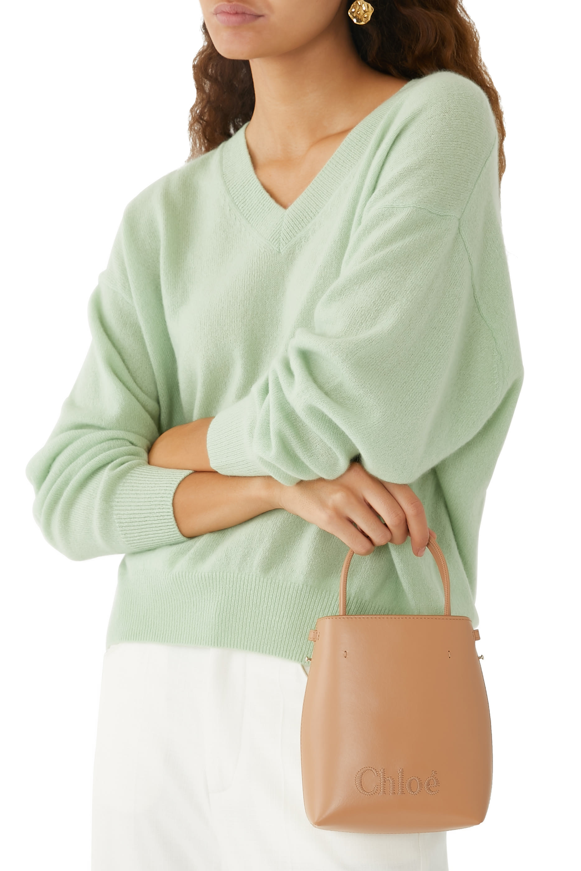 حقيبة سينس صغيرة بشعار الماركة المحاك