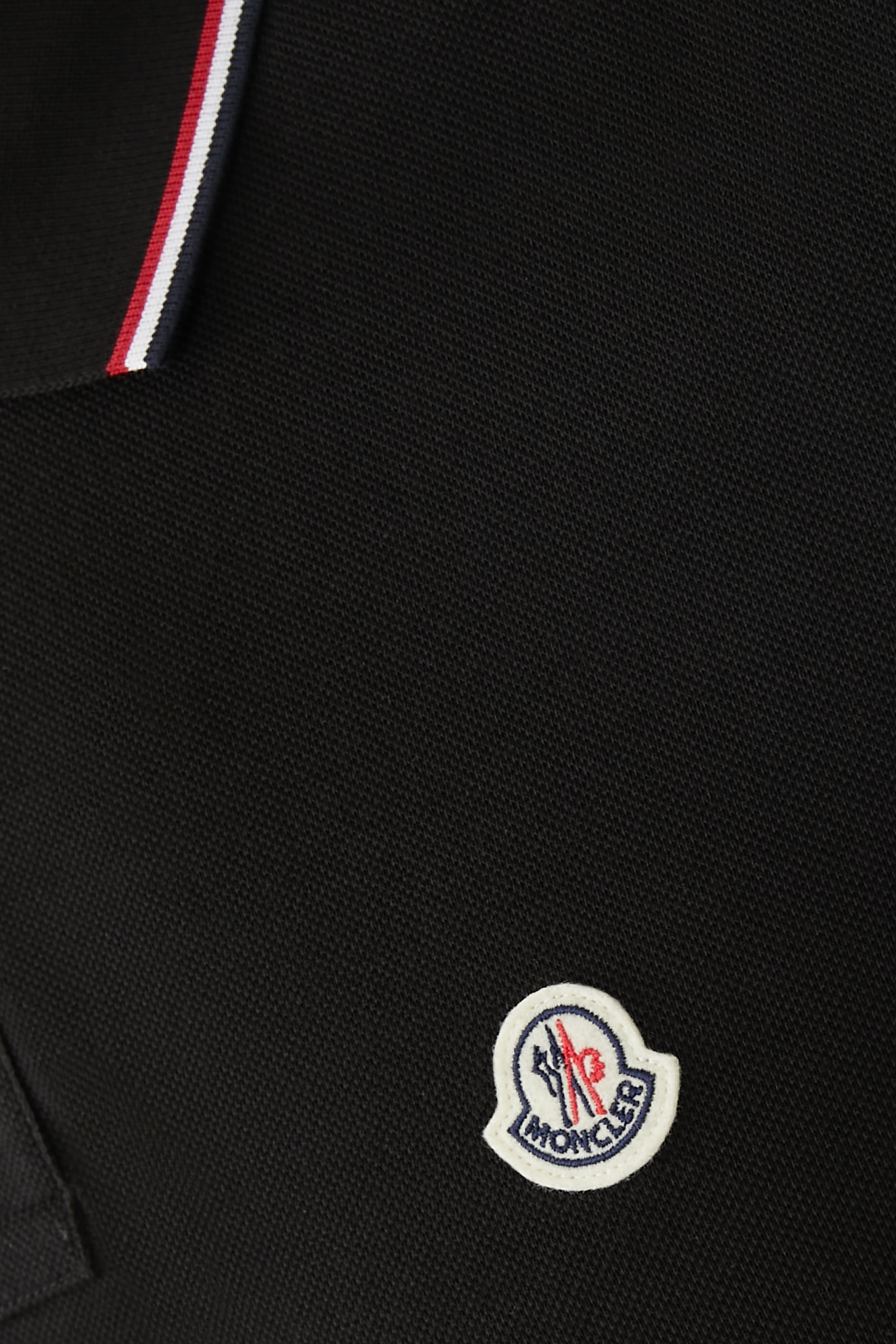 قميص بولو بشعار الماركة