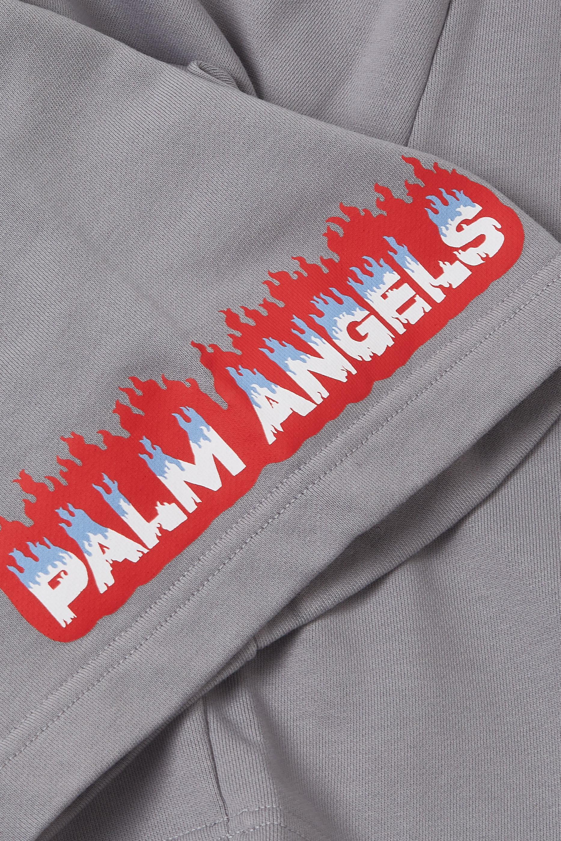 شورت رياضي للأطفال بطبعات شعلة