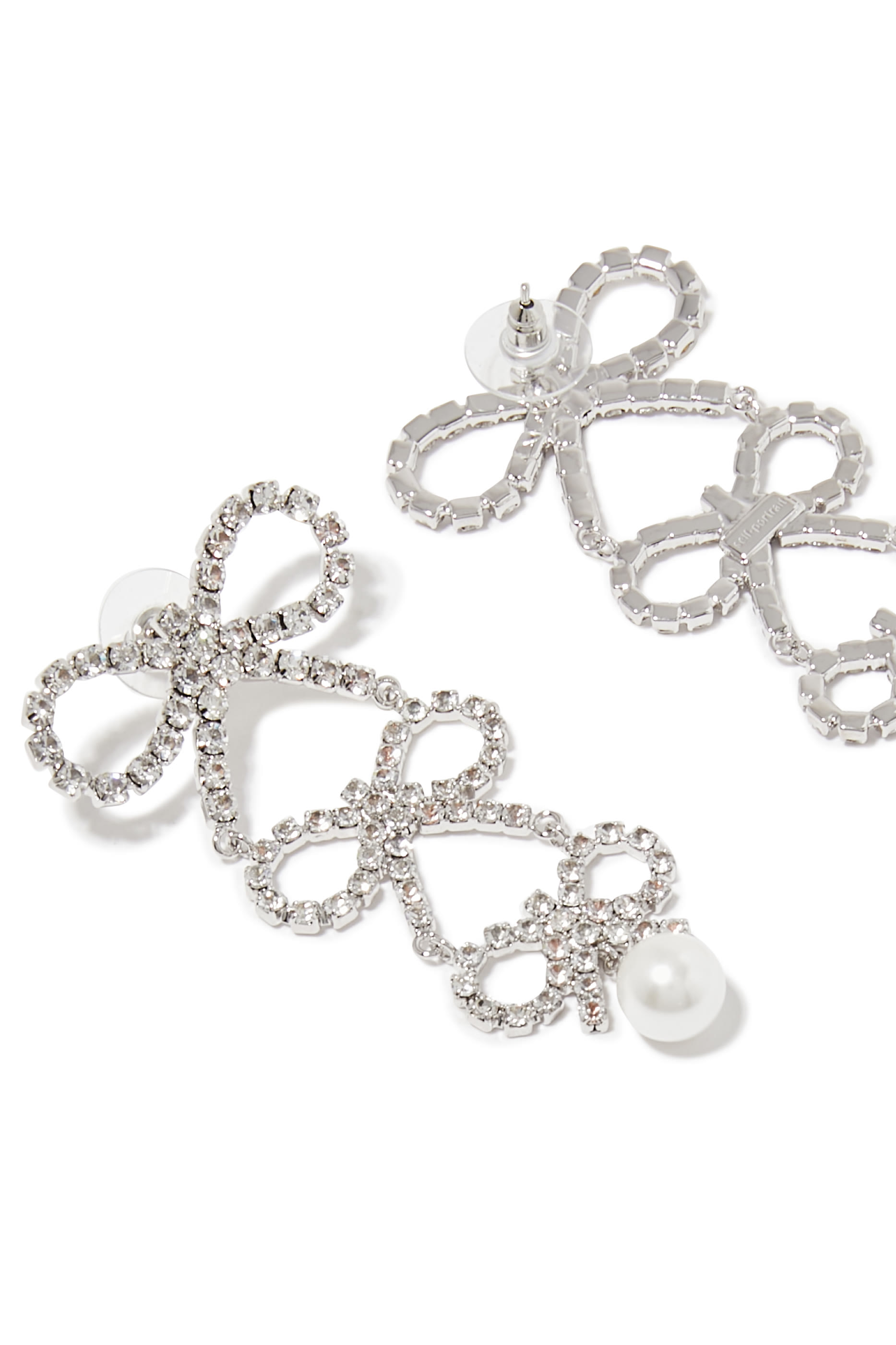 أقراط بفيونكات بتصميم متدرج مرصعة بكريستال