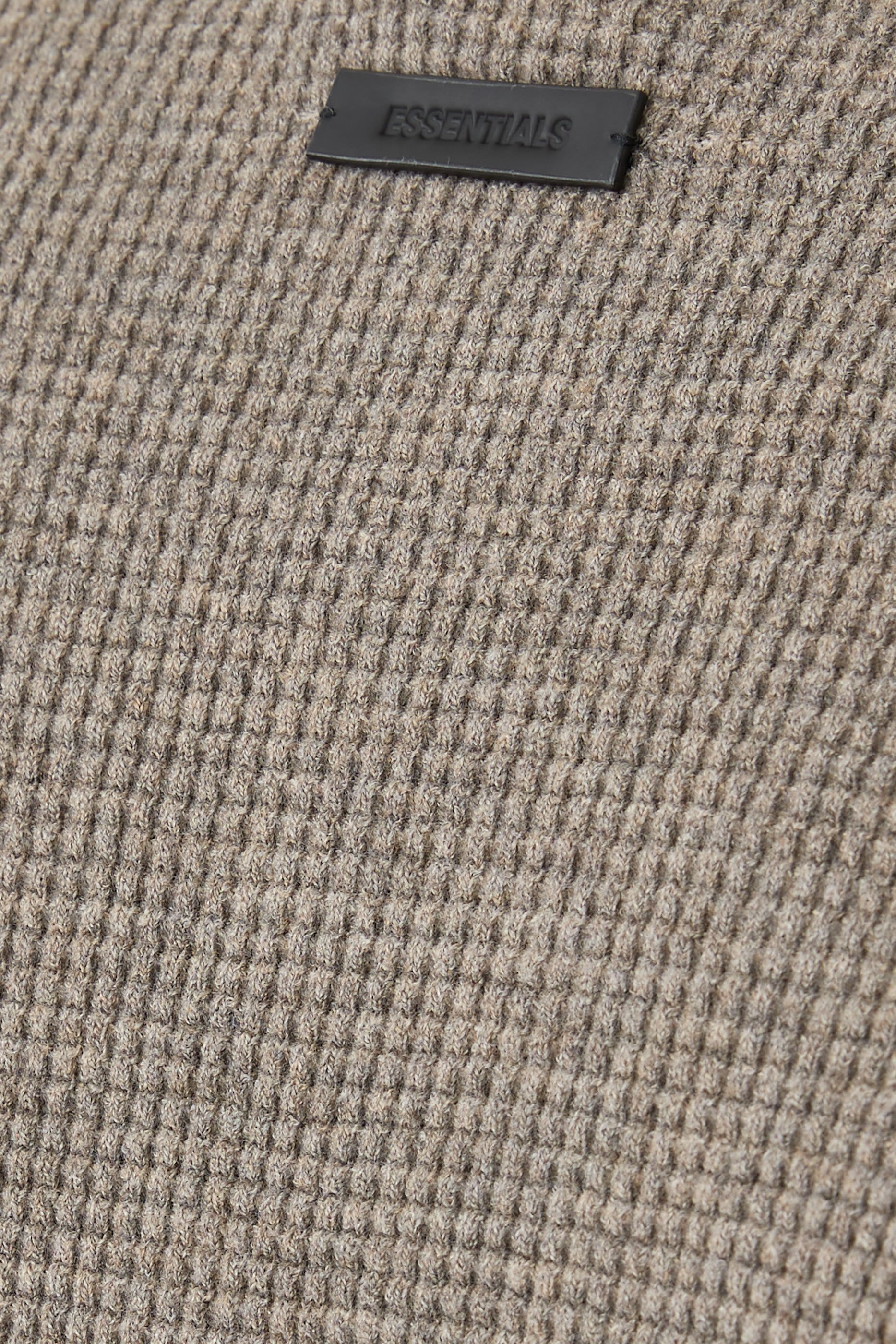 سترة بياقة ضيقة بتصميممن التسعينات نسيج متشابك