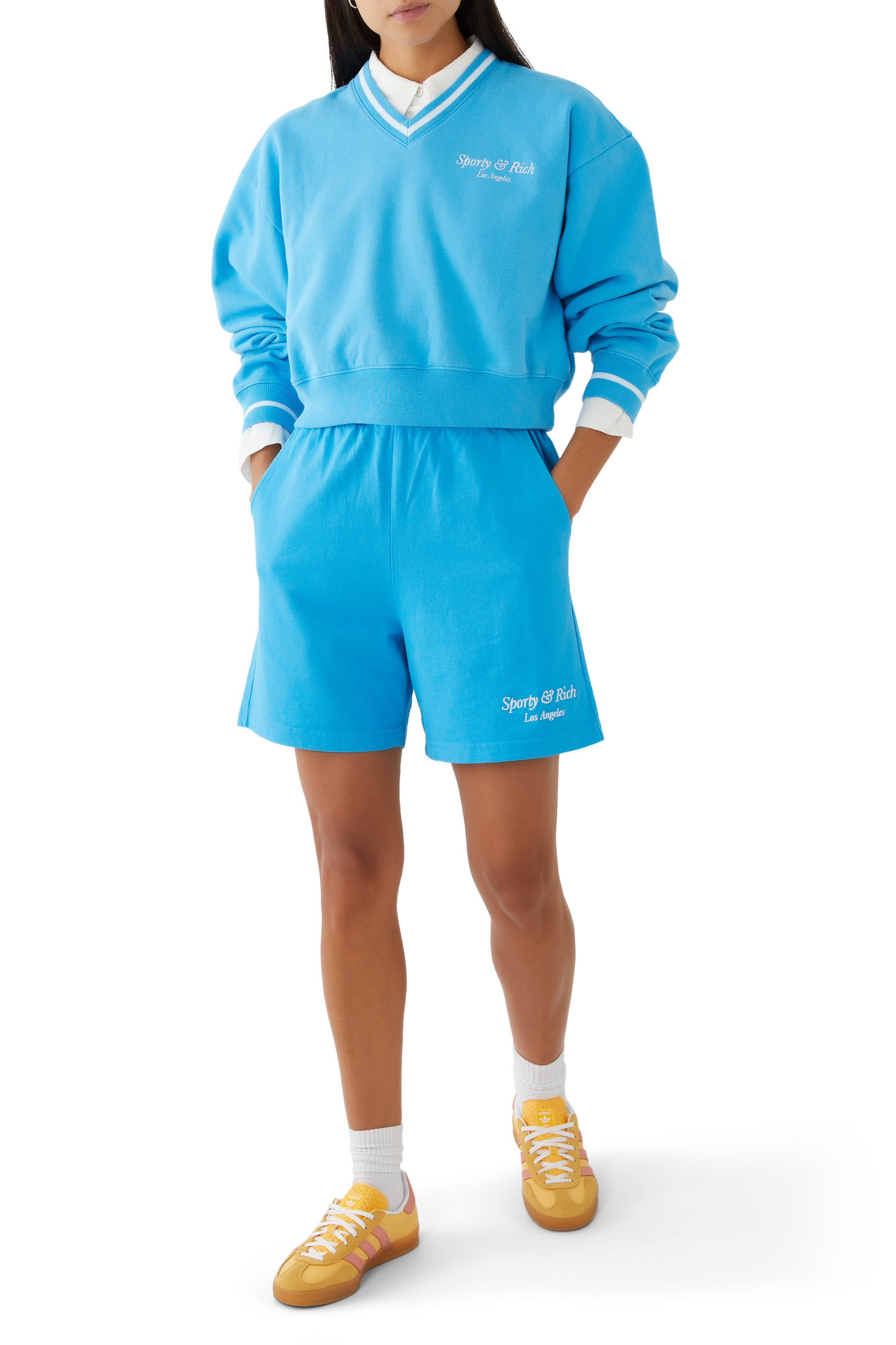 سترة بياقة V بشعار الماركة بتصميم مائل