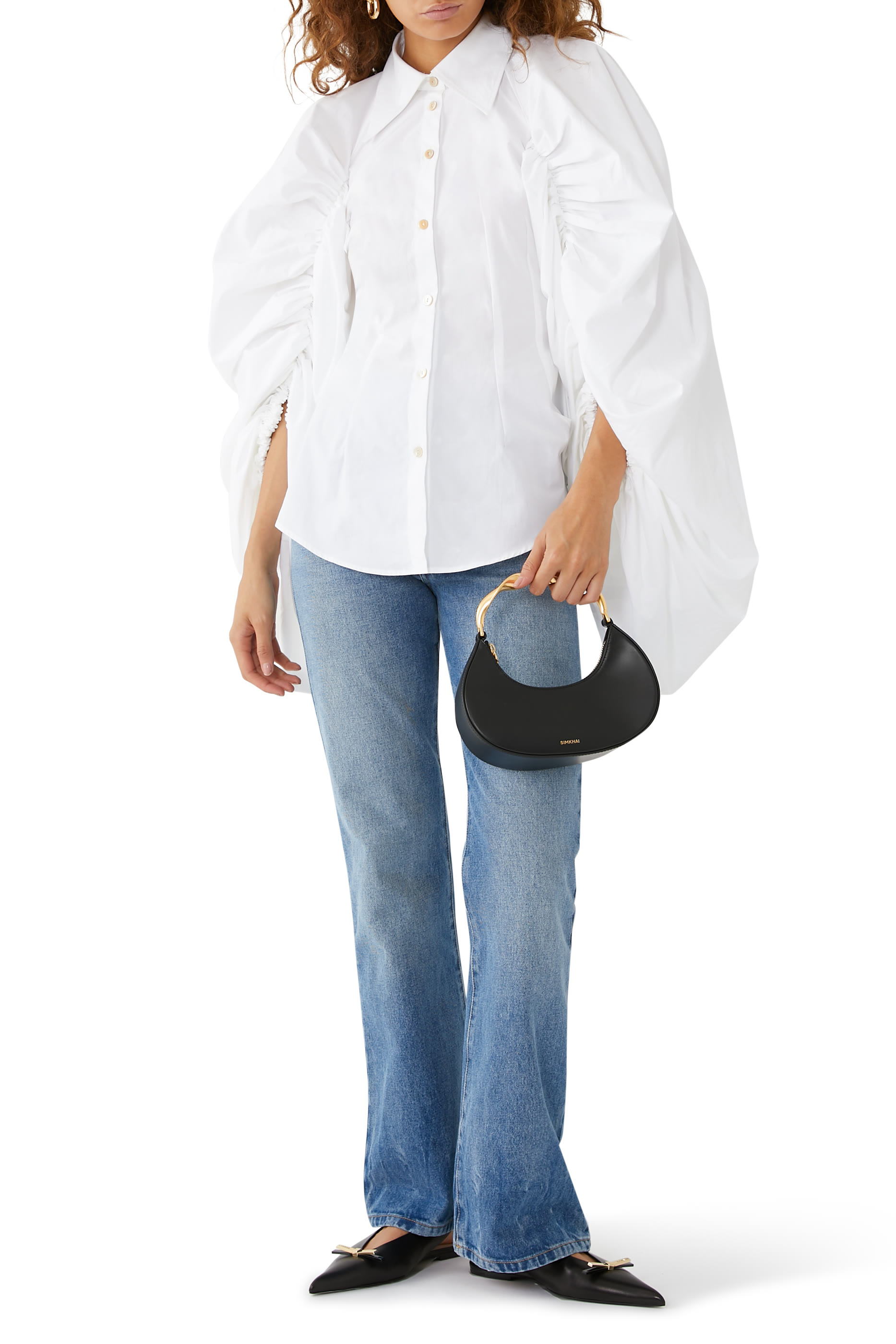 قميص ملفوف بأكمام كبيرة