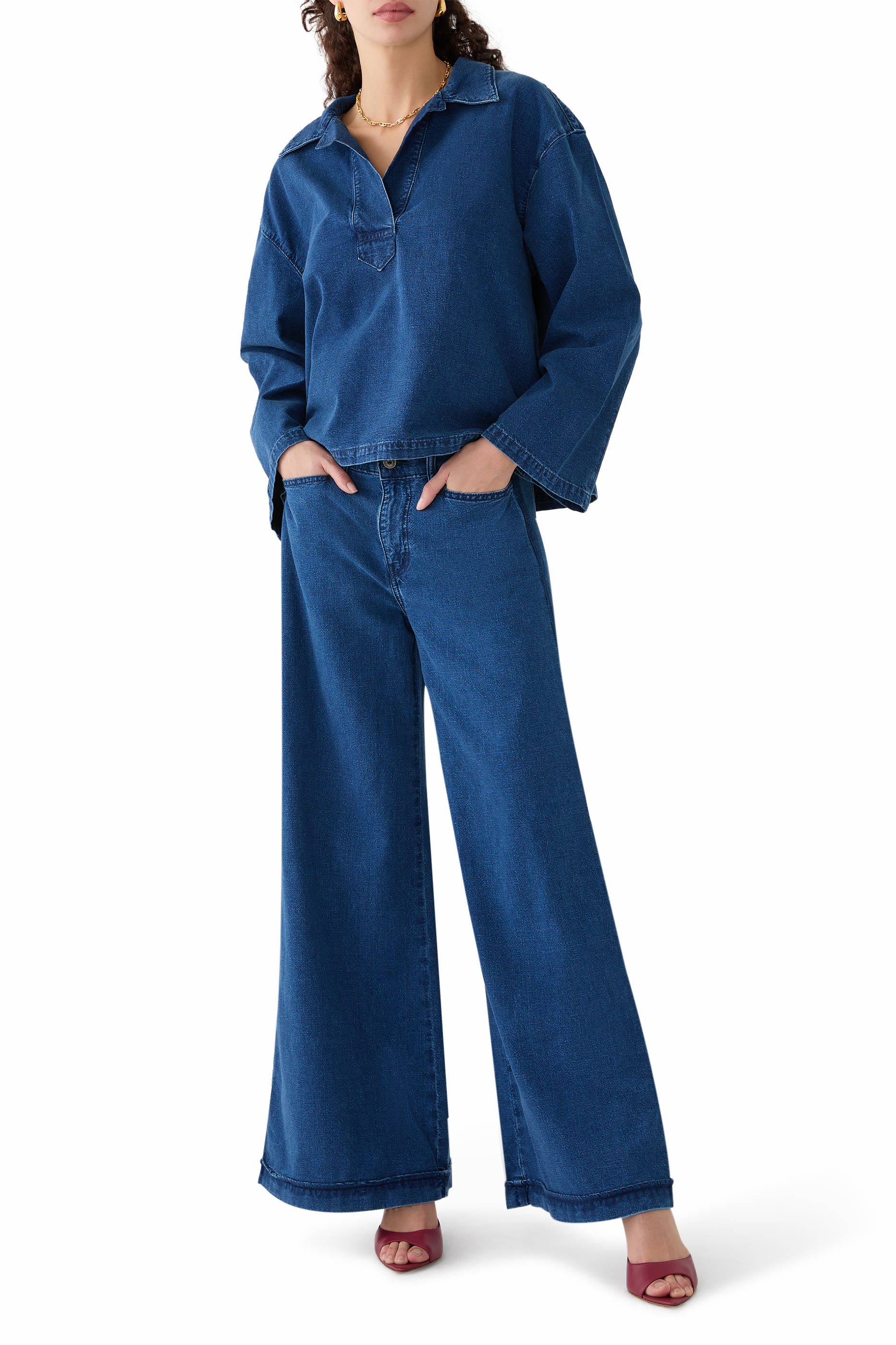 بنطال طويل بقصة ساق واسعة وخصر متوسط الارتفاع