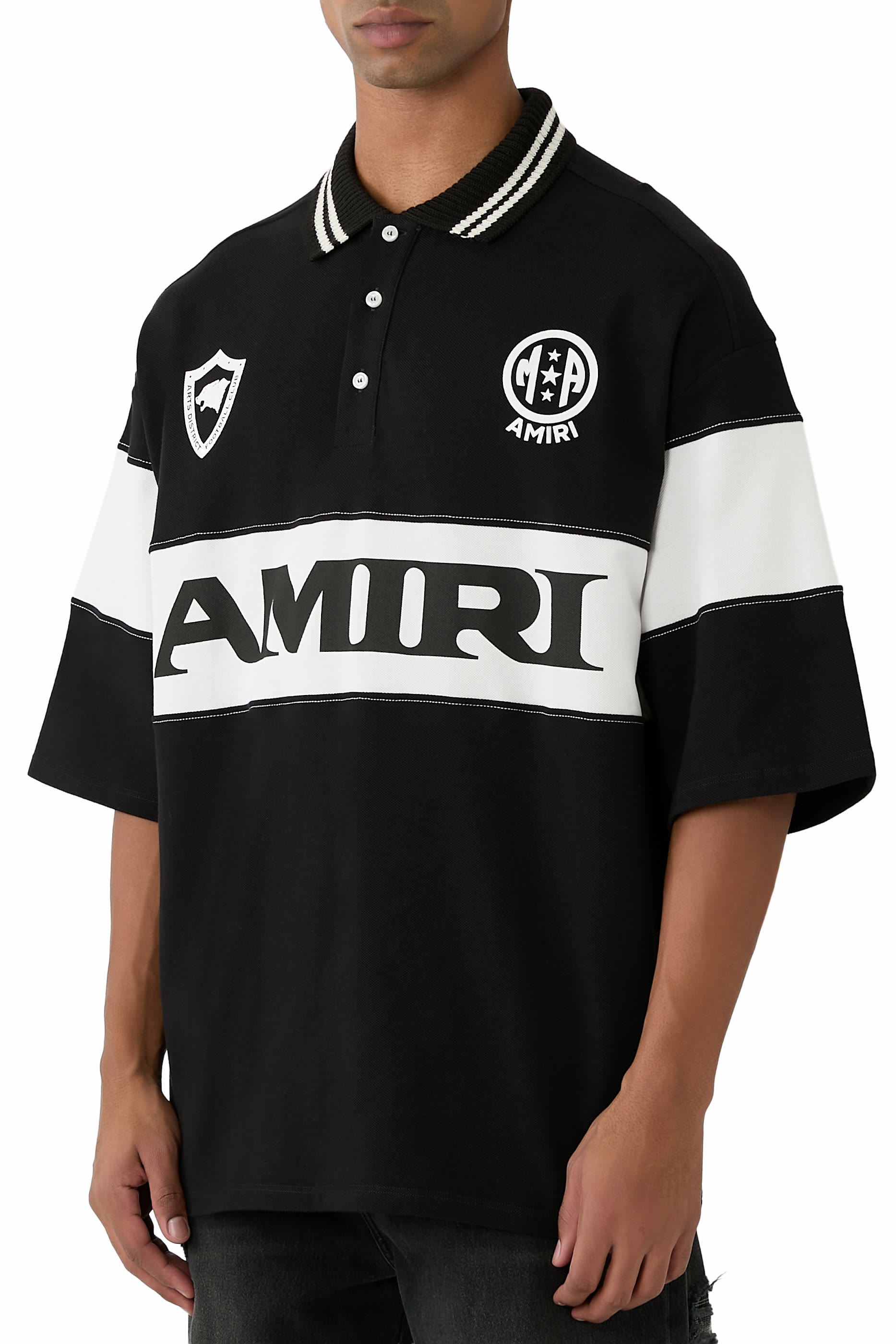 قميص بولو رياضي بقصة فضفاضة