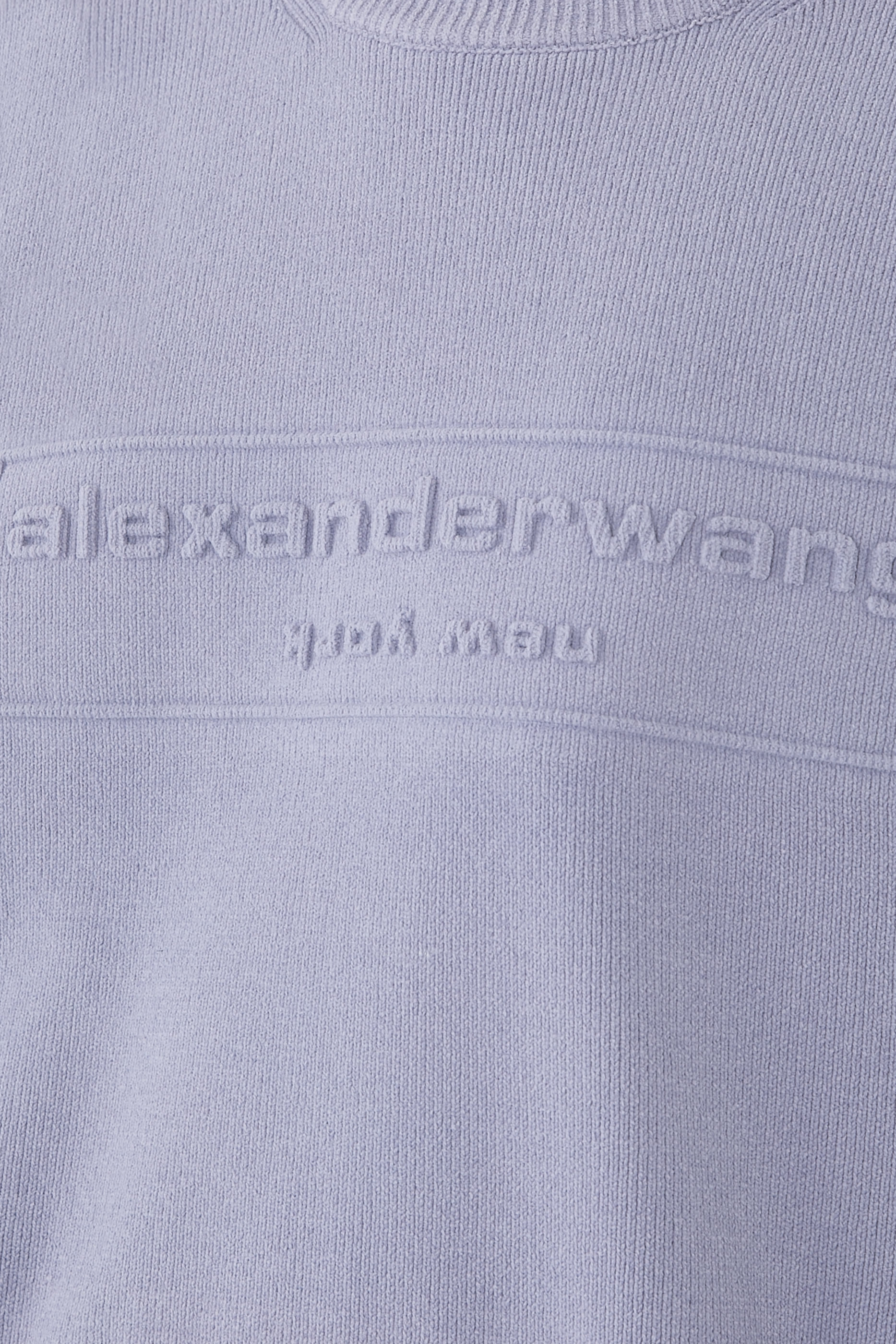 كنزة بشعار الماركة قماش مضلع