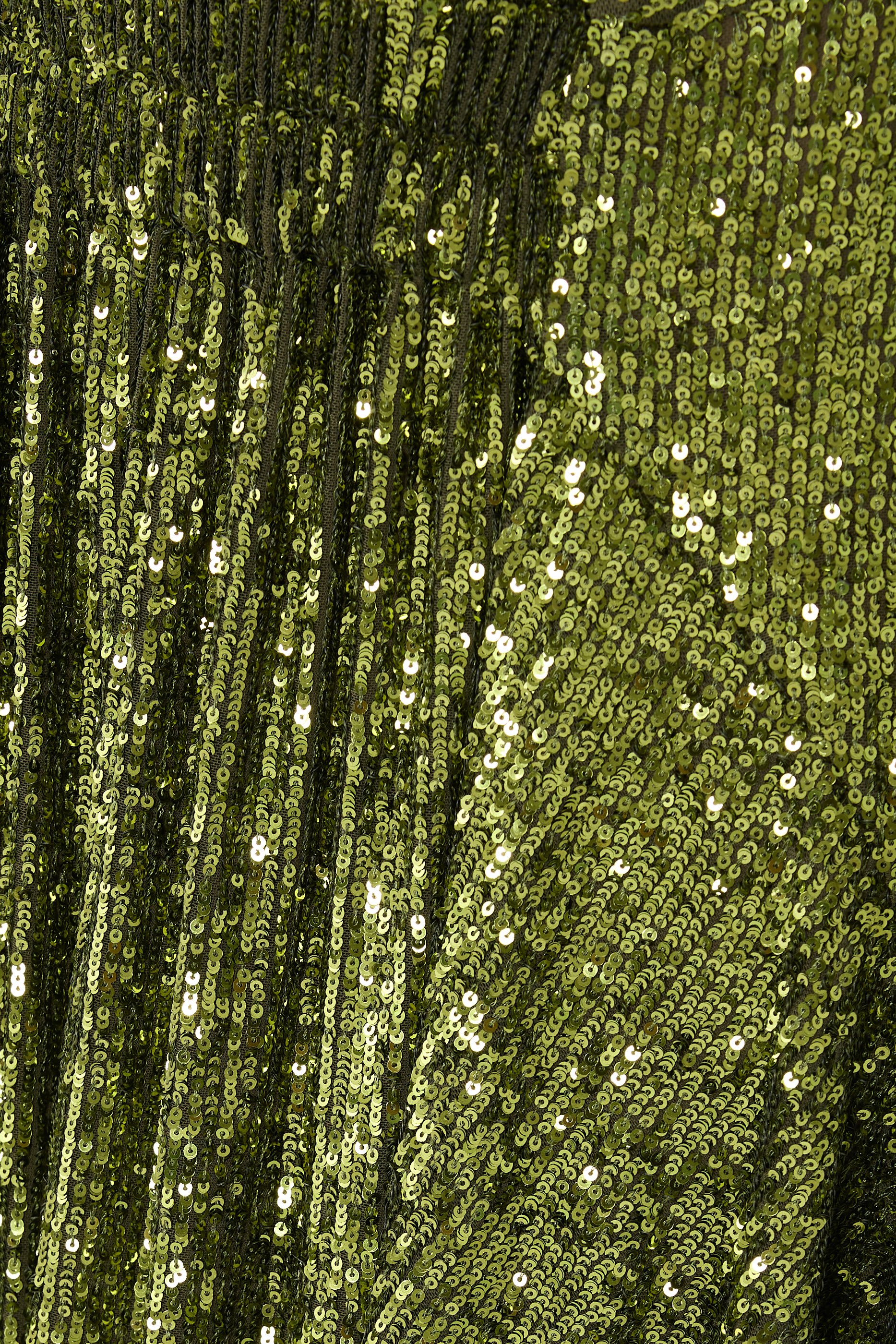 تنورة متوسطة الطول بتصميم غير متماثل مزينة بترتر