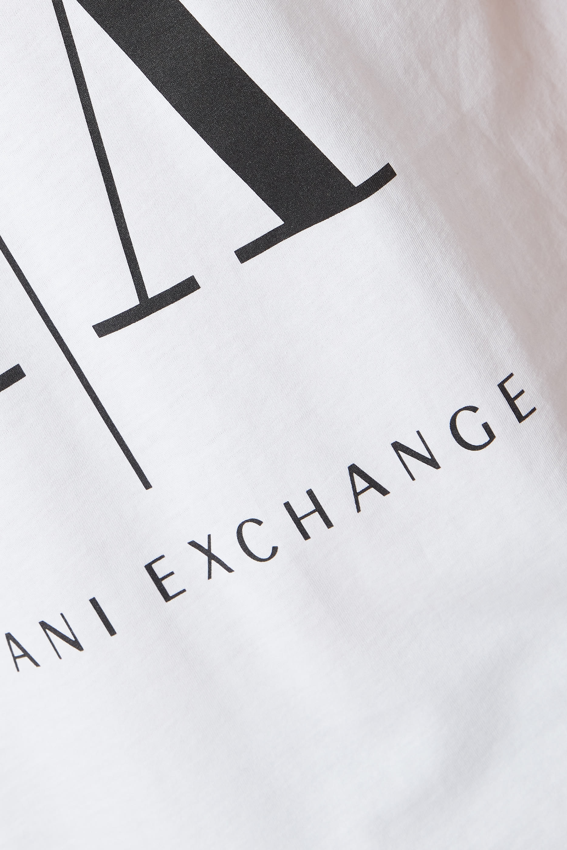 تي شيرت قطن بطبعة كبيرة بشعار الماركة