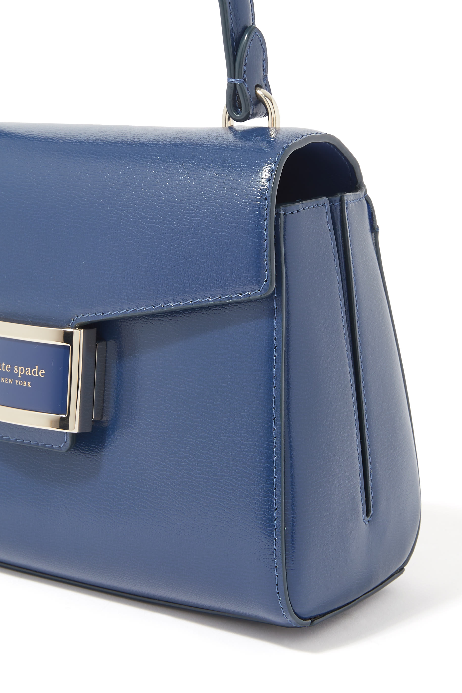 حقيبة كاتي صغيرة بيد علوية جلد لامع