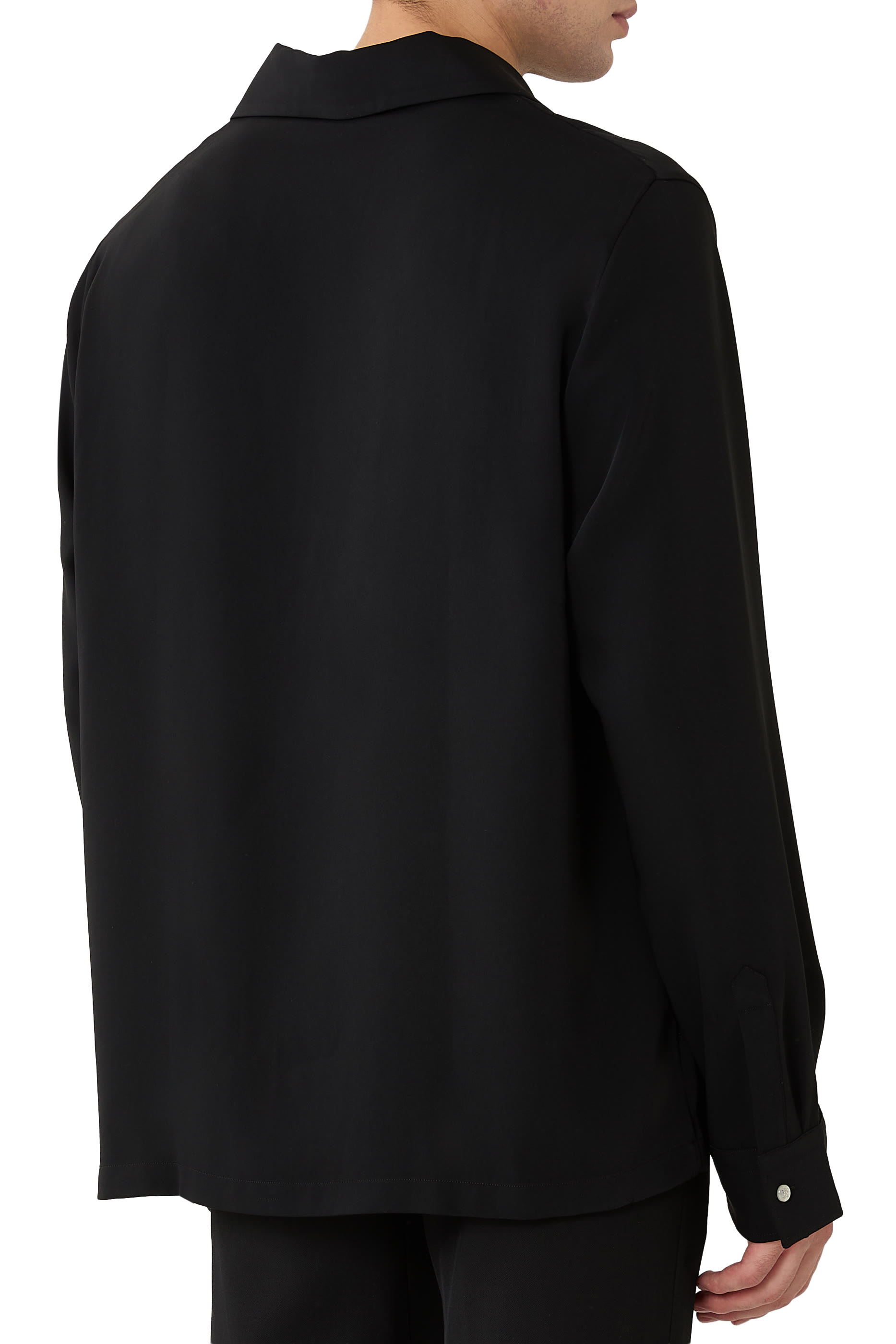 قميص بجيوب بحواف دائرية