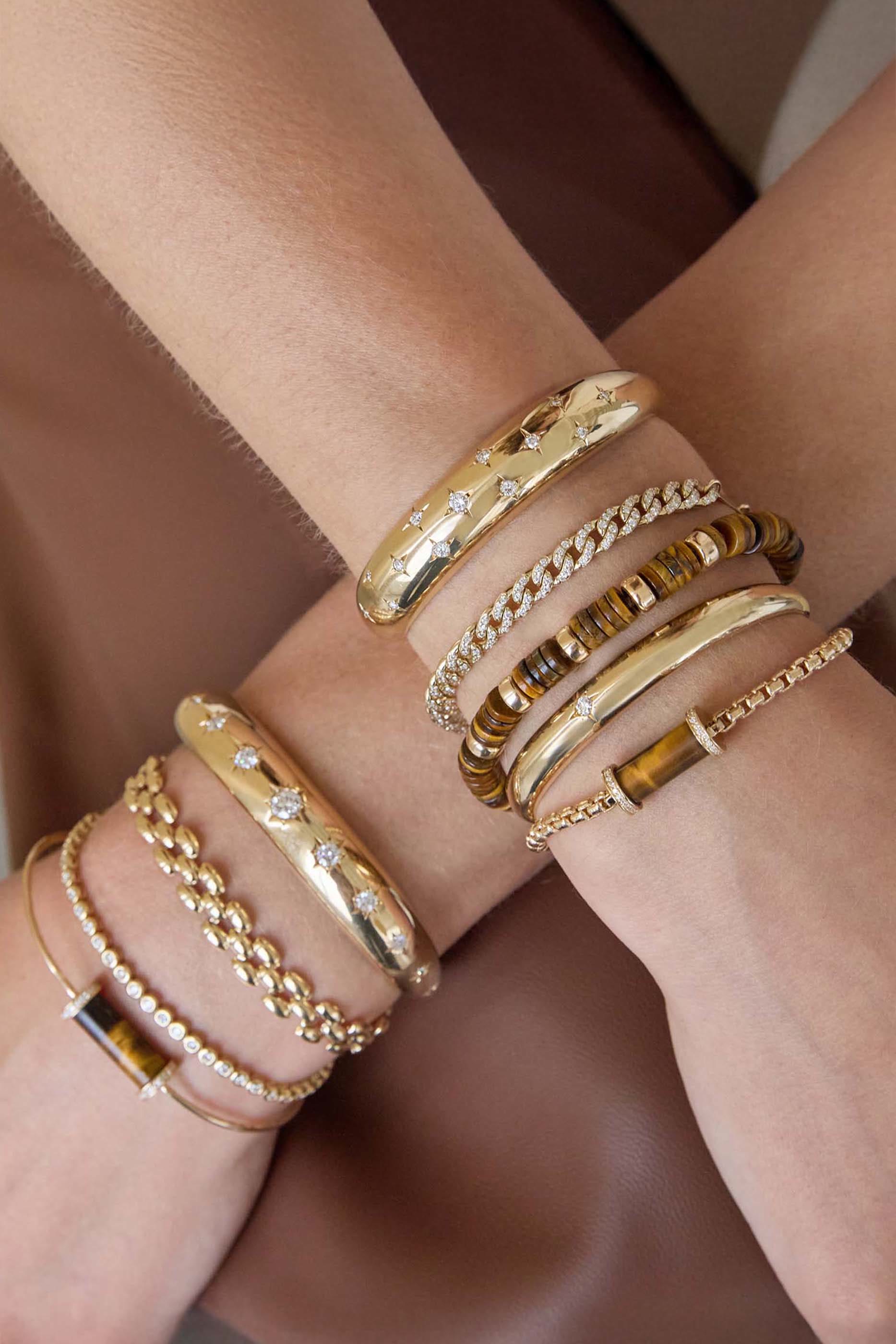 سوار أورا مفتوح مرصع بماسة بتصميم نجمة، ذهب أصفر عيار 14