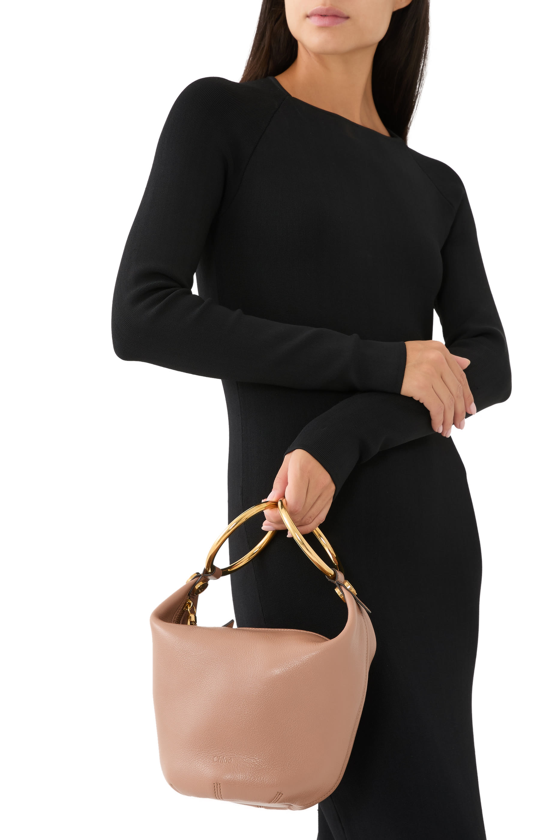 حقيبة صغيرة بيد على شكل سوار