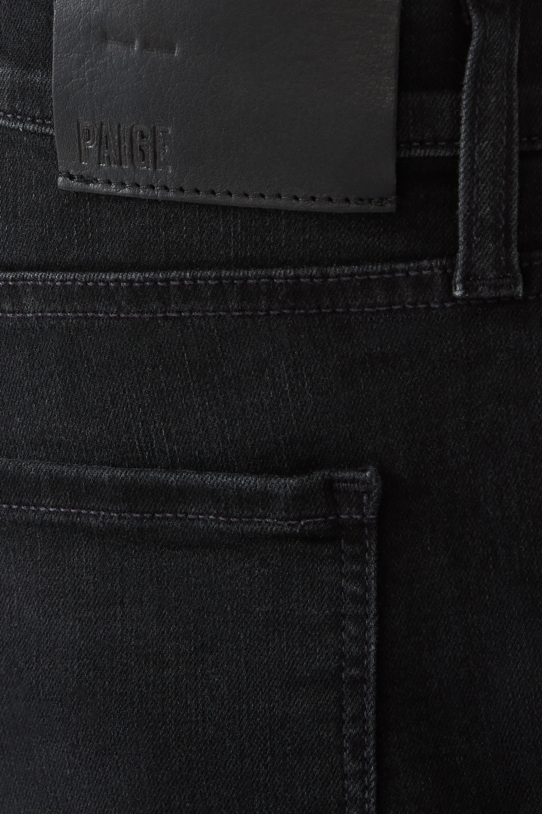 بنطال جينز ترنساند فينتج ويلكوكس بقصة ضيقة من الأسفل