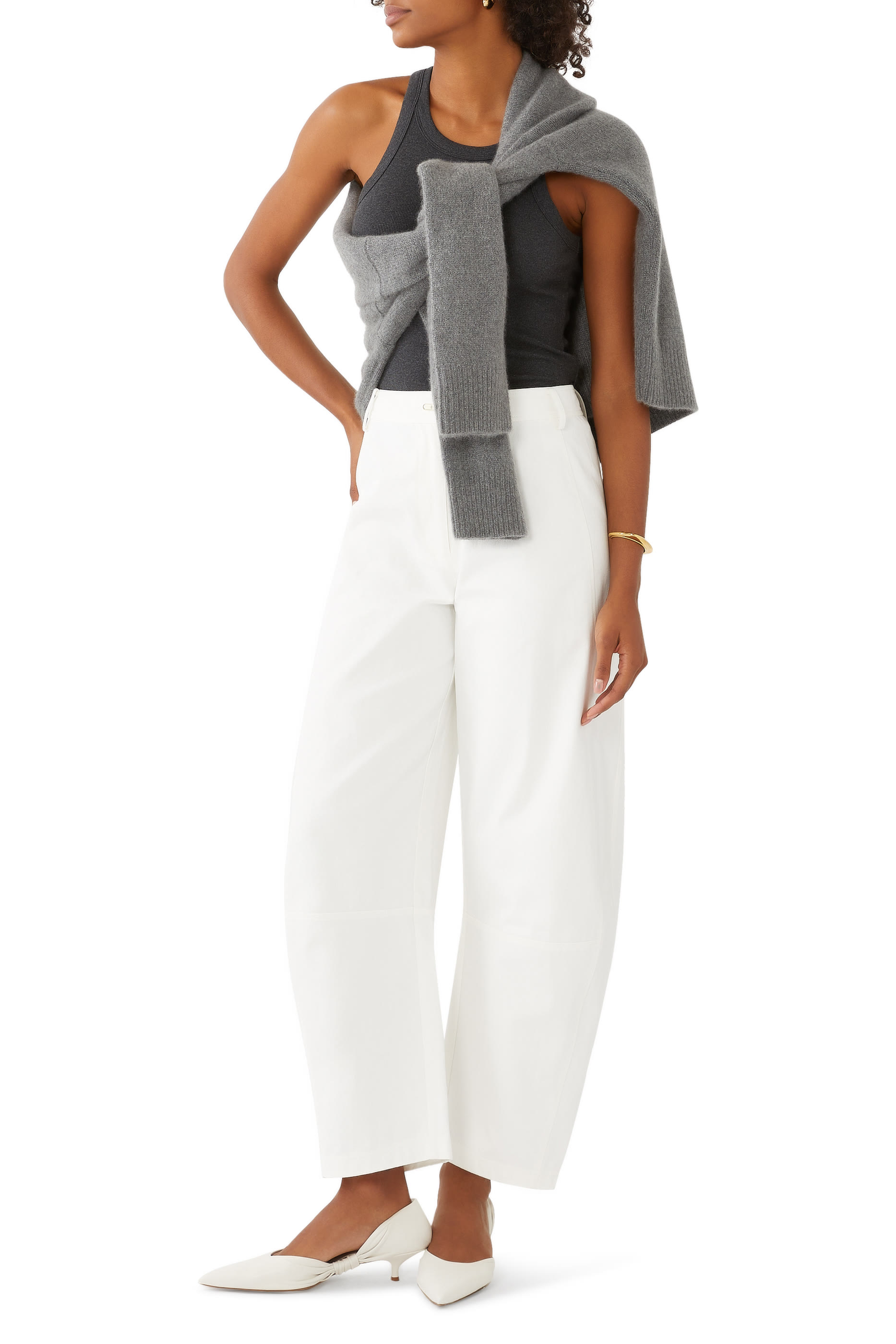 بلوزة بلا أكمام بحواف مقوسة قماش مضلع