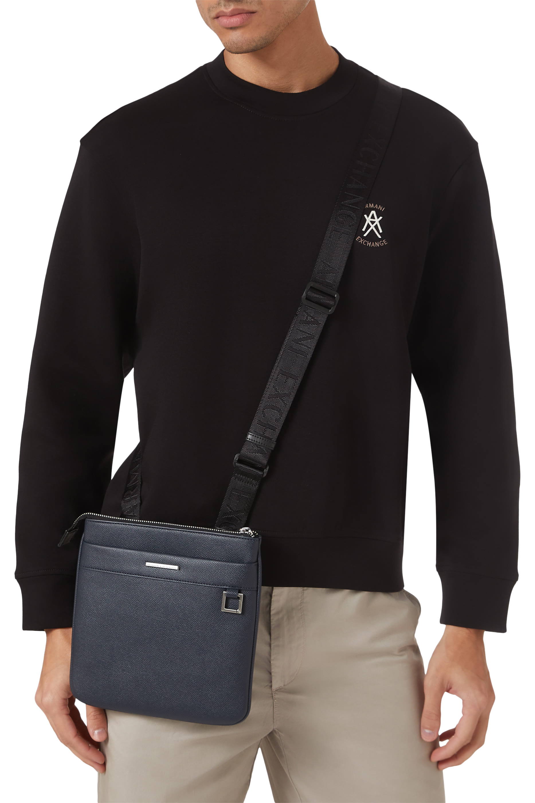 حقيبة كروس بودي بشعار الماركة قماش معالج