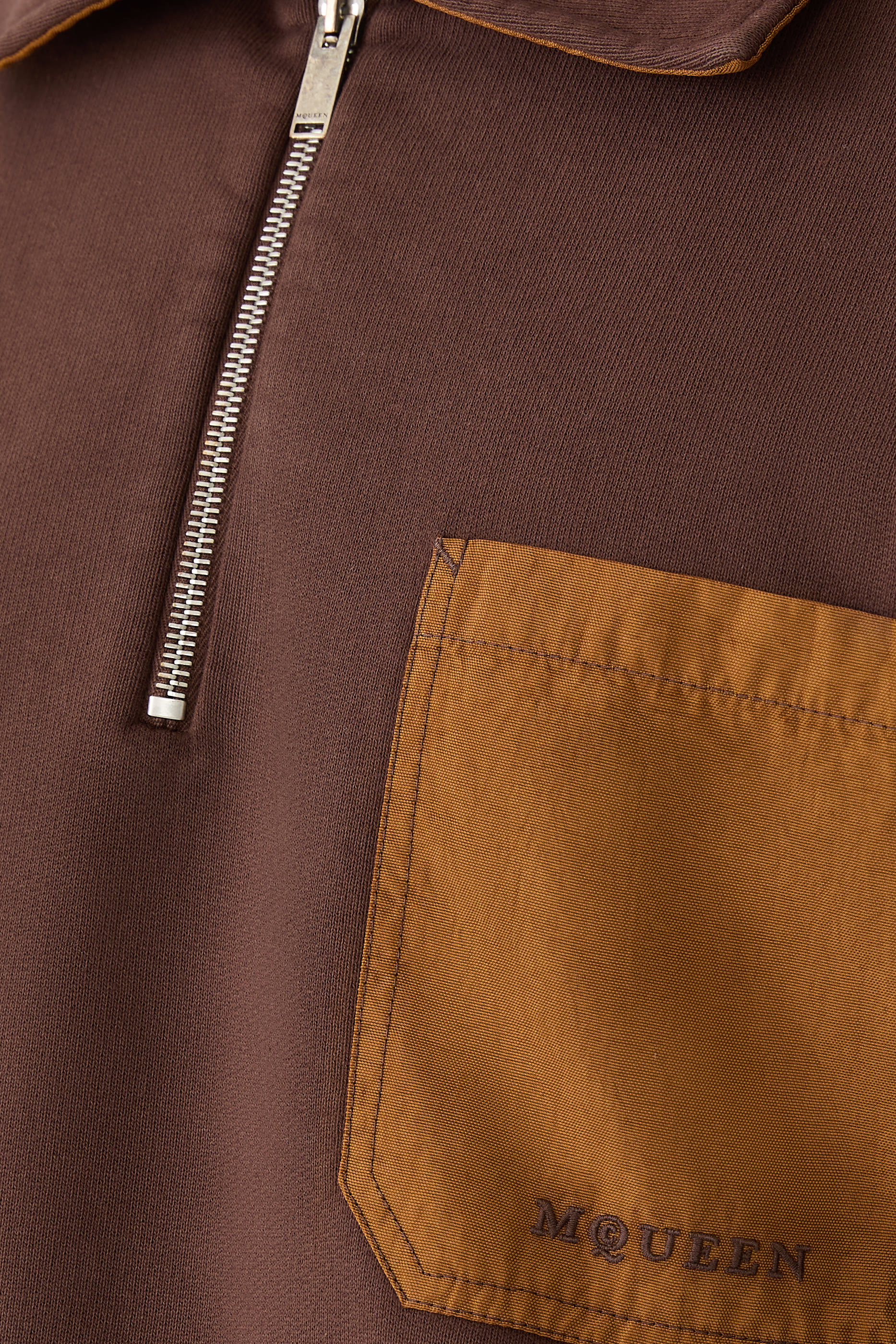 بلوزة رياضية بنصف سحاب