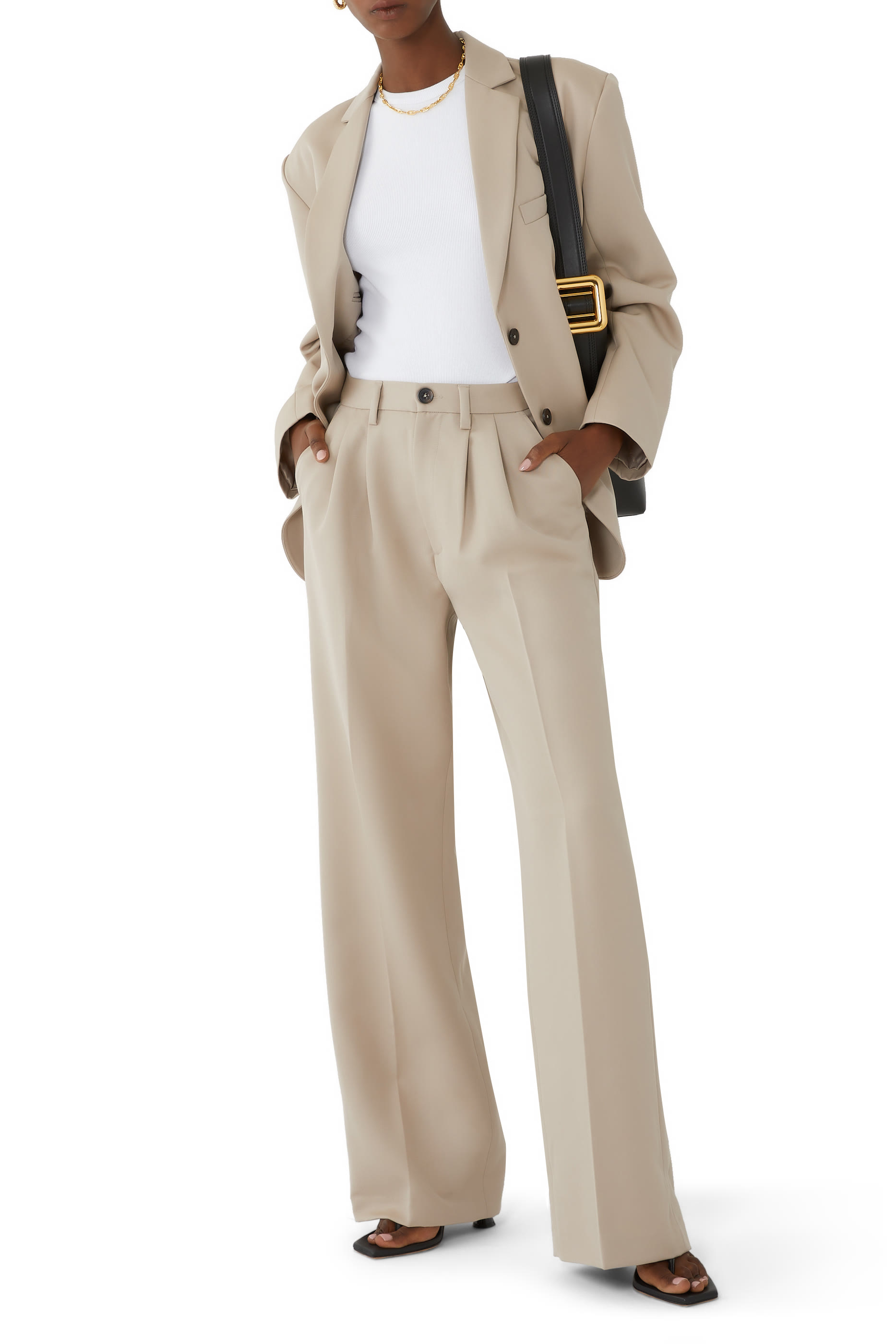 بنطال كاري بقصة ساق واسعة وخصر مرتفع