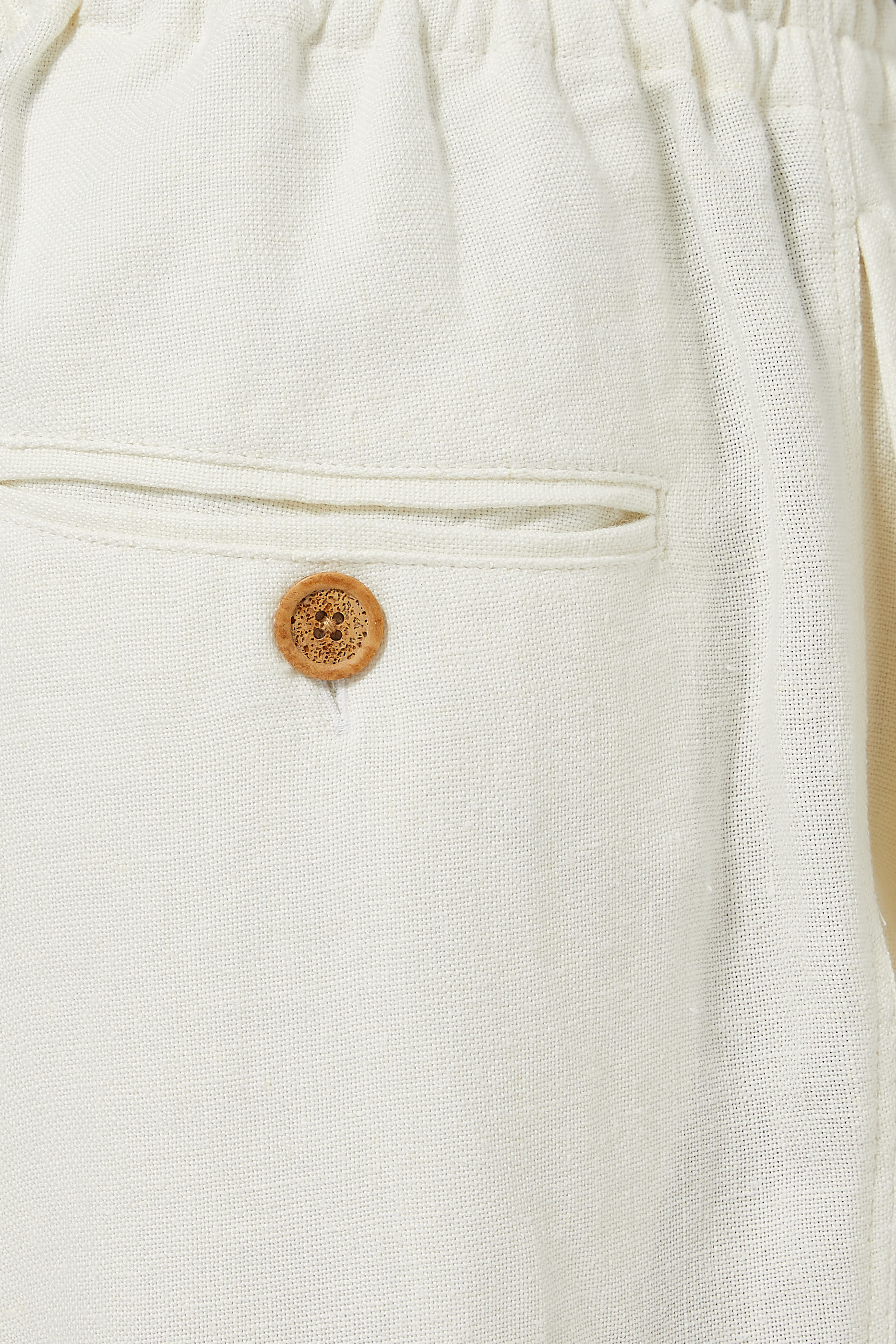 بنطال كتان بقصة ساقين واسعتين