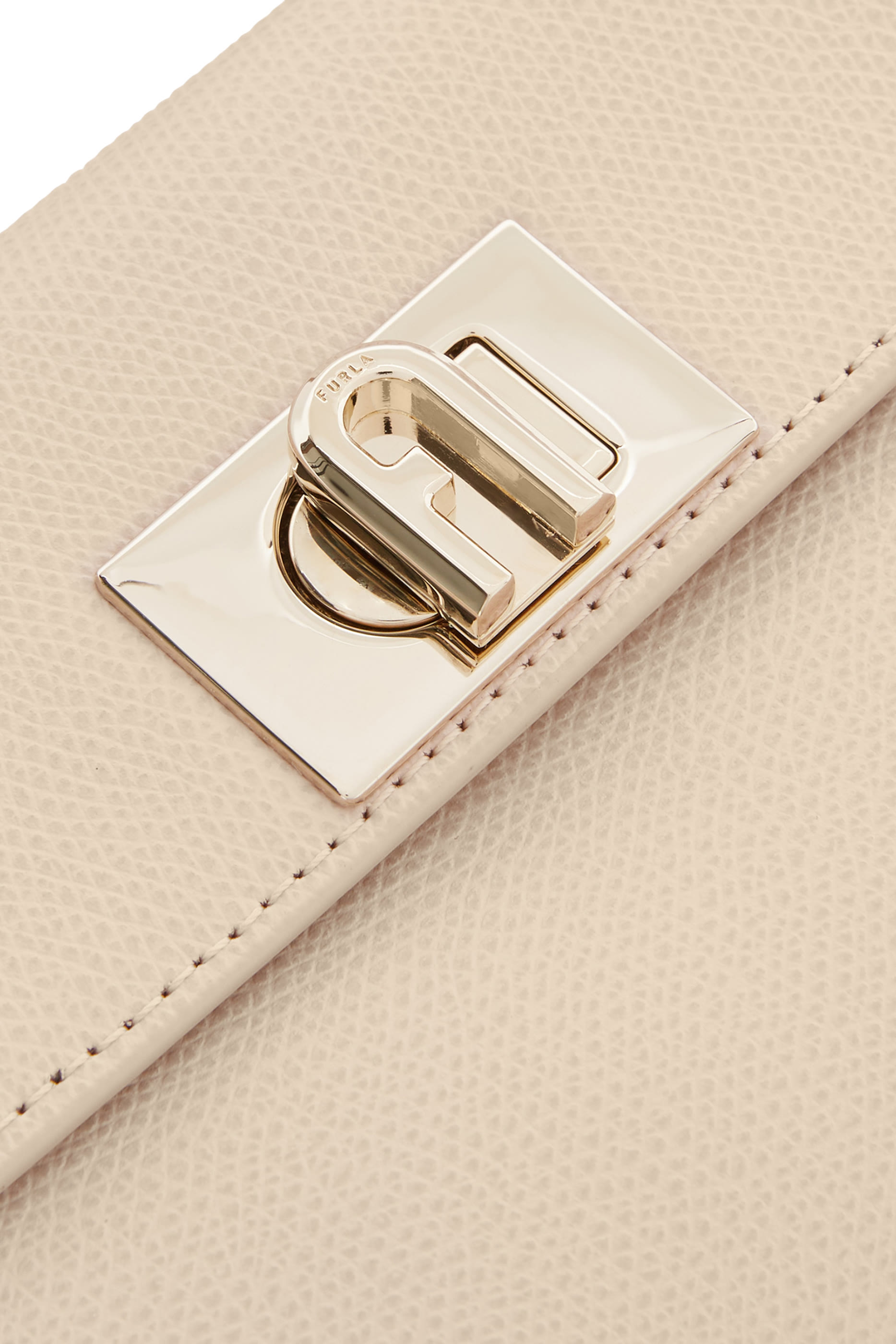 حقيبة يد صغيرة جلد