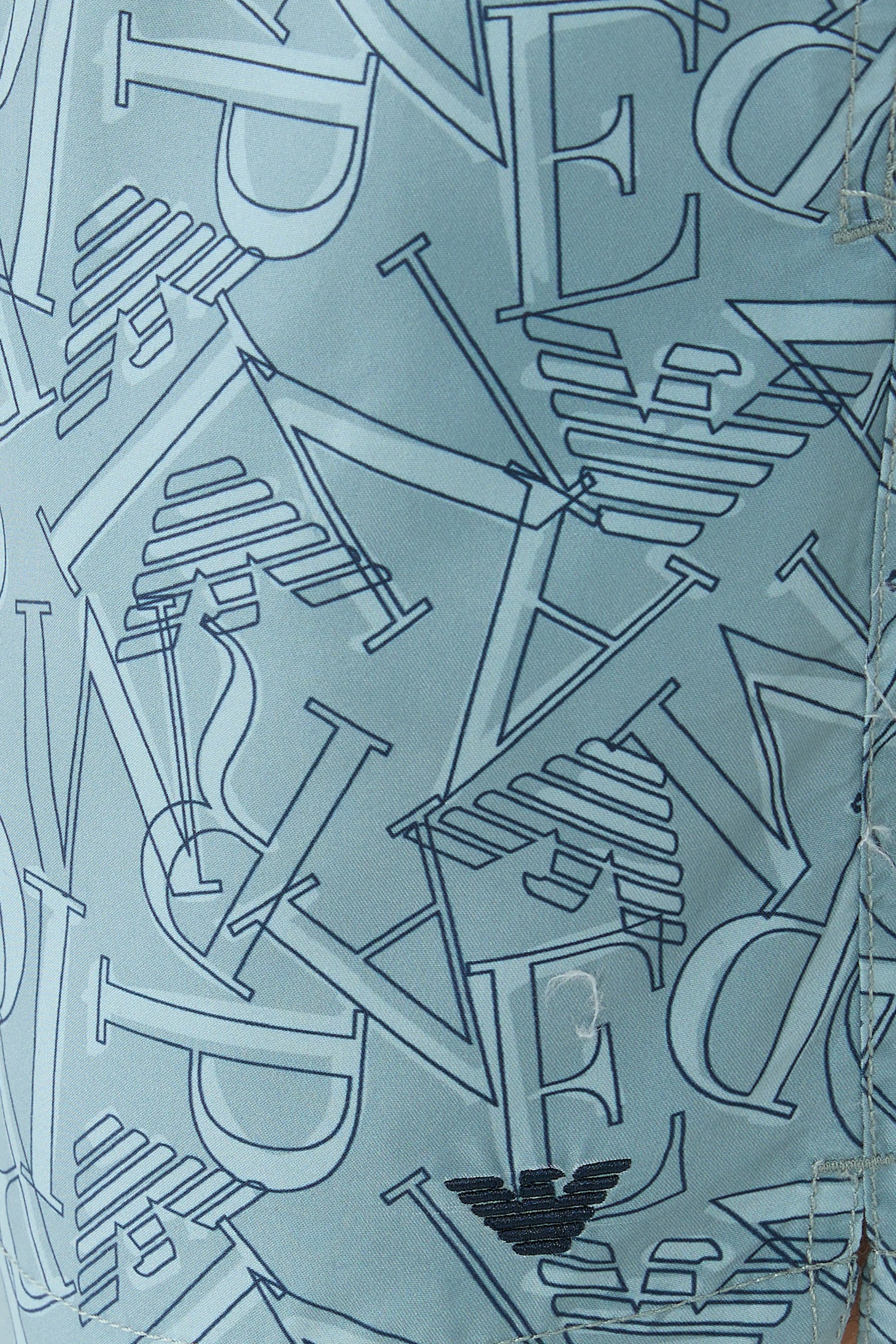 شورت سباحة بشعار الماركة