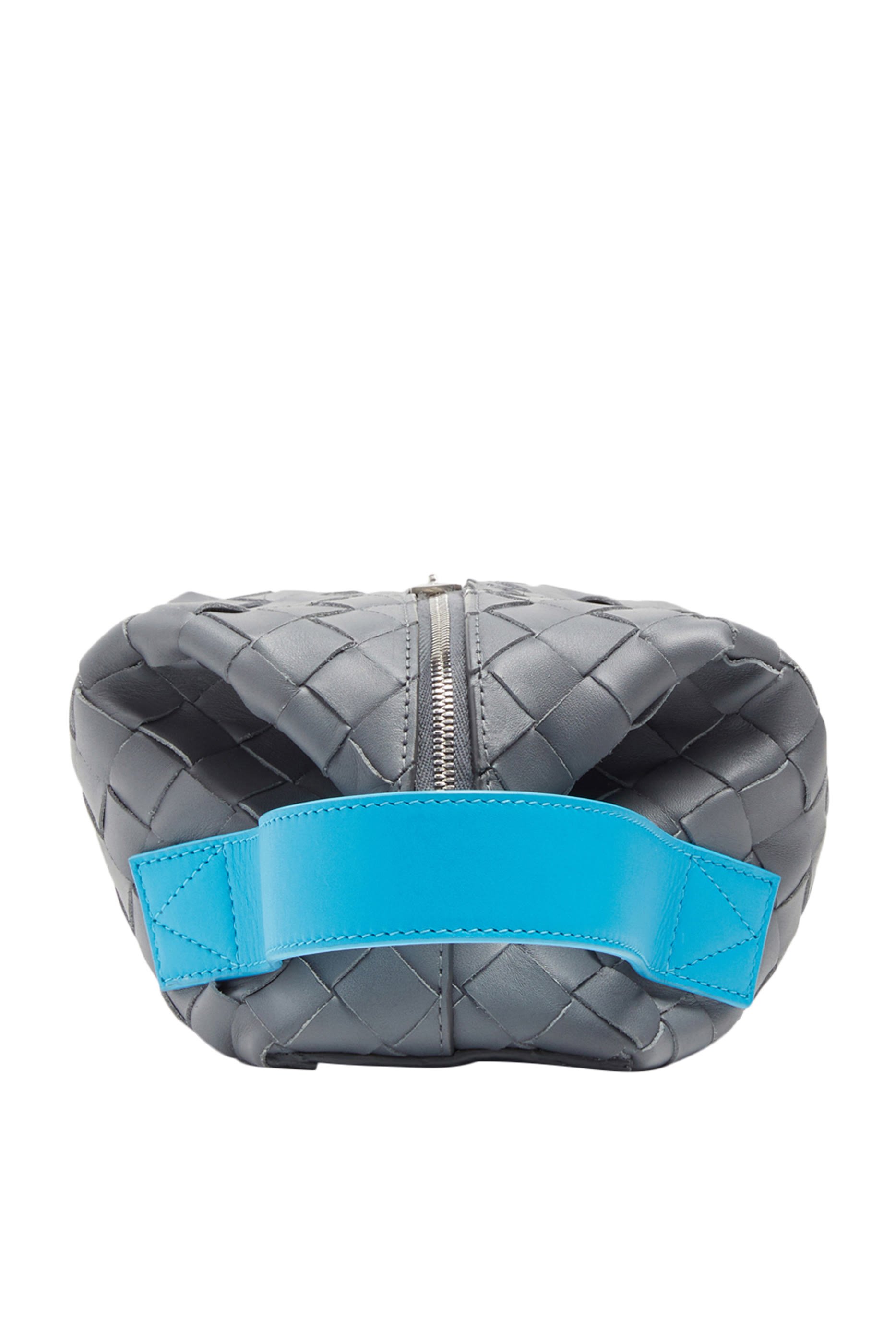 حقيبة مستحضرات تجميل جلد بتصميم مجدول