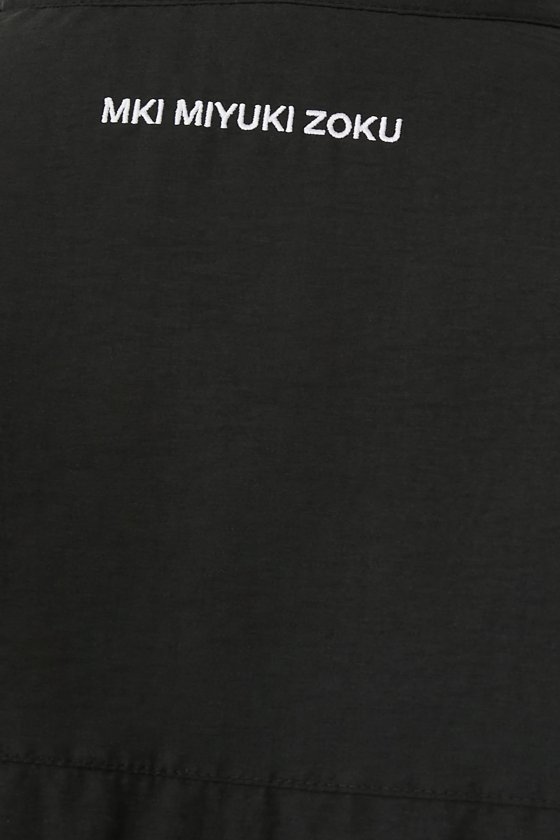 جاكيت رياضي بلون باهت نايلون وقطن