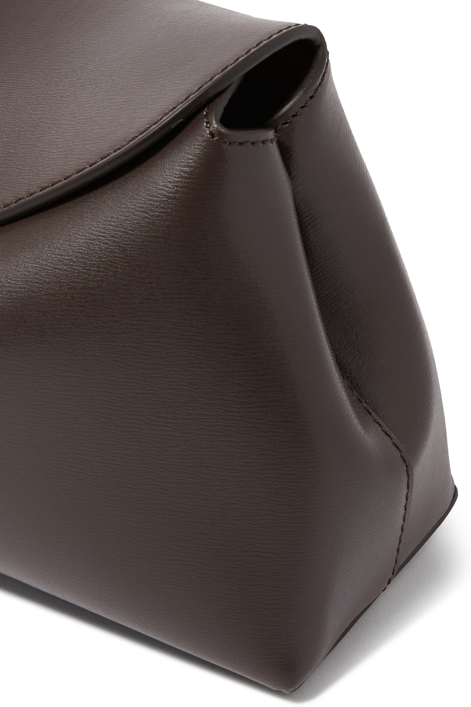 حقيبة كلاتش بقفل على شكل حرف T جلد