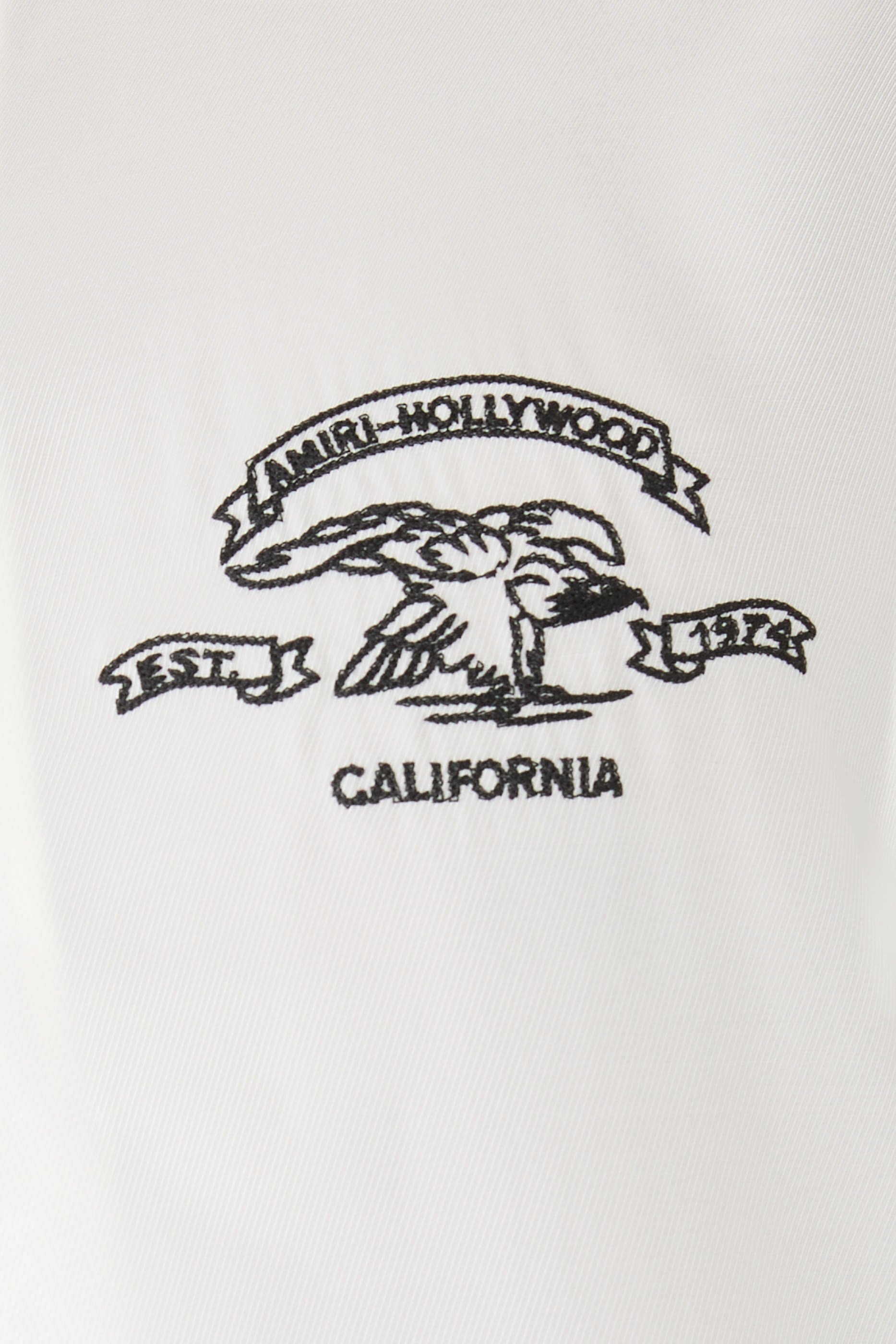 قميص بياقة بطيّة