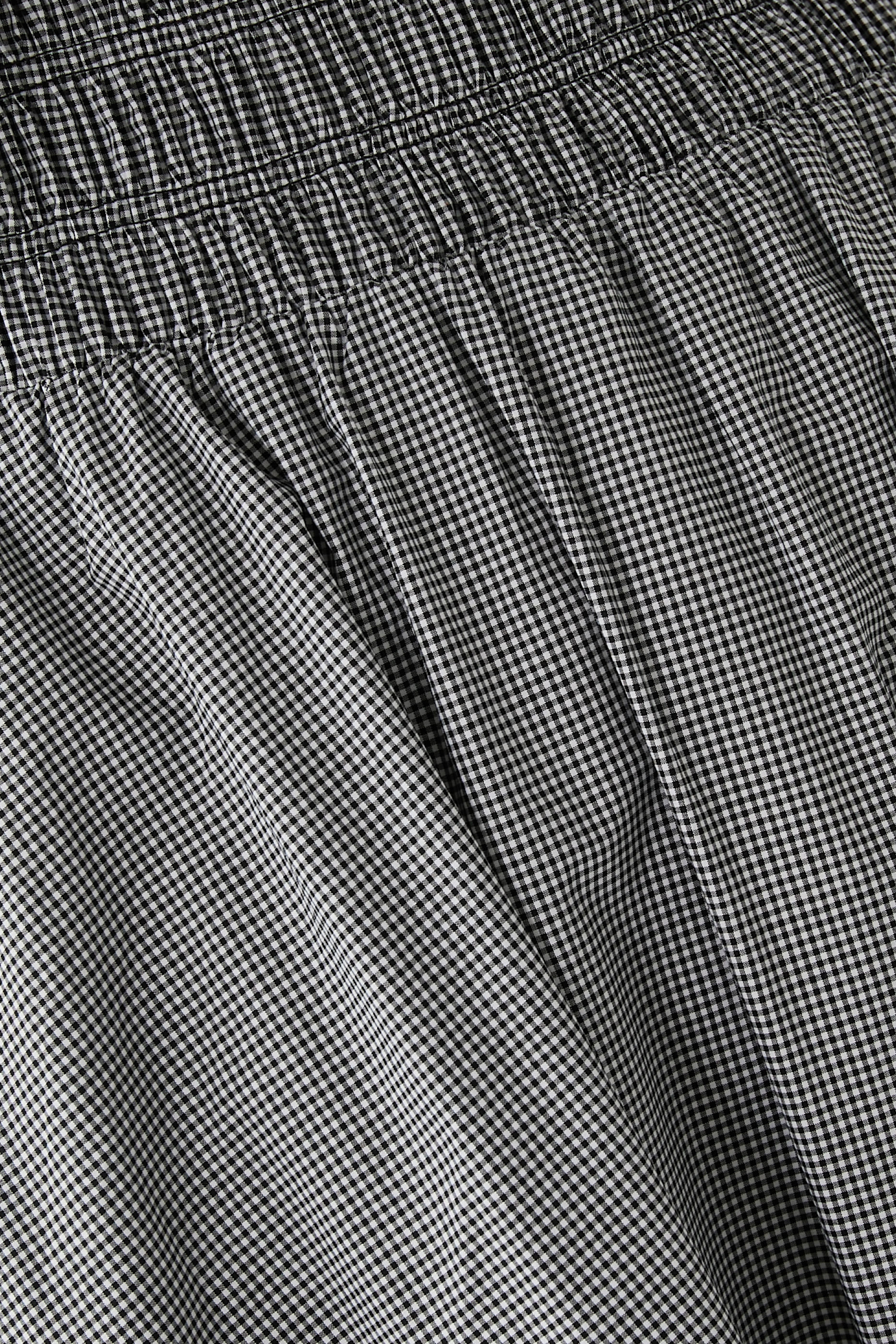 فستان ليدا طويل بنقشة مربعات