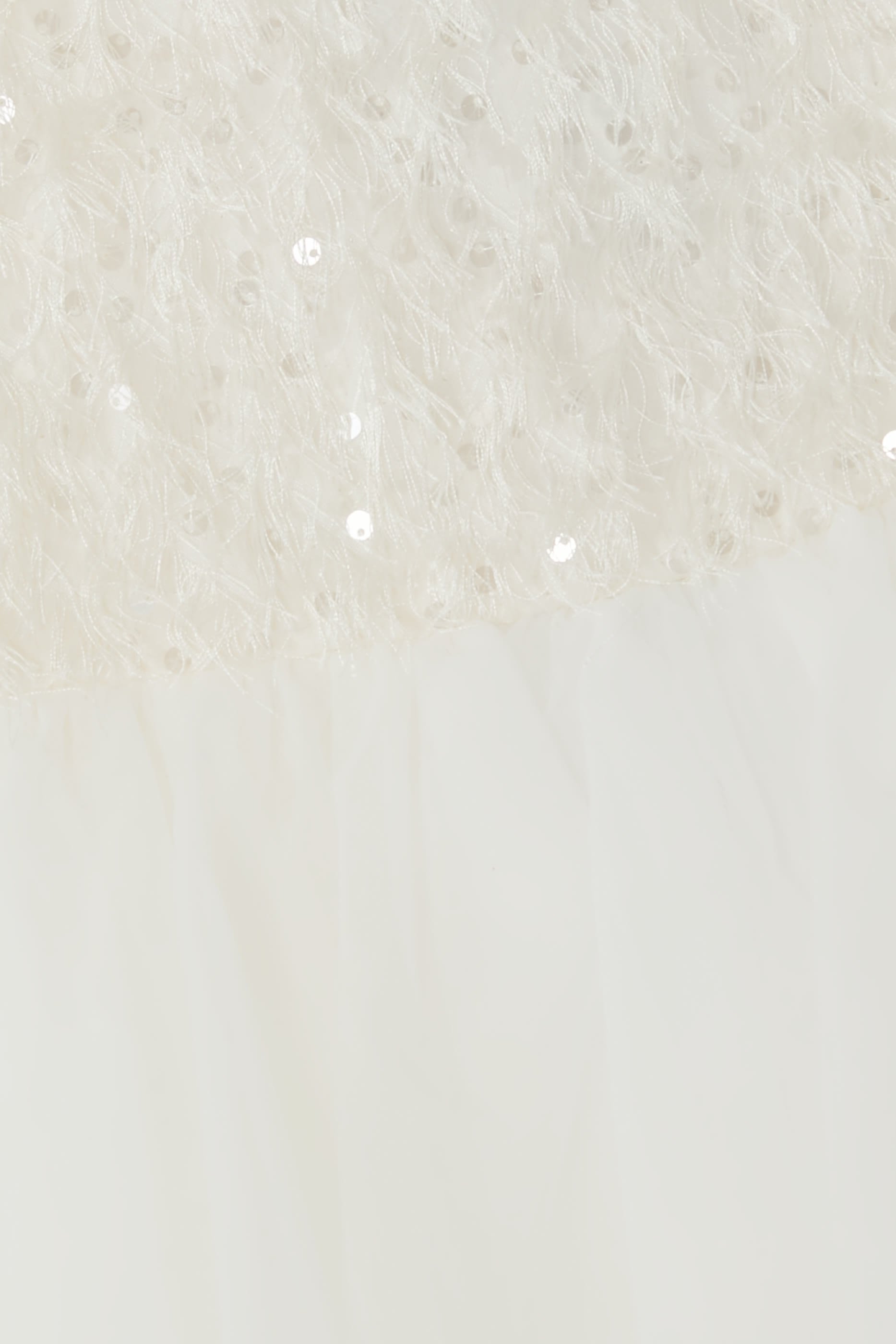 فستان مزين بالترتر والريش للأطفال