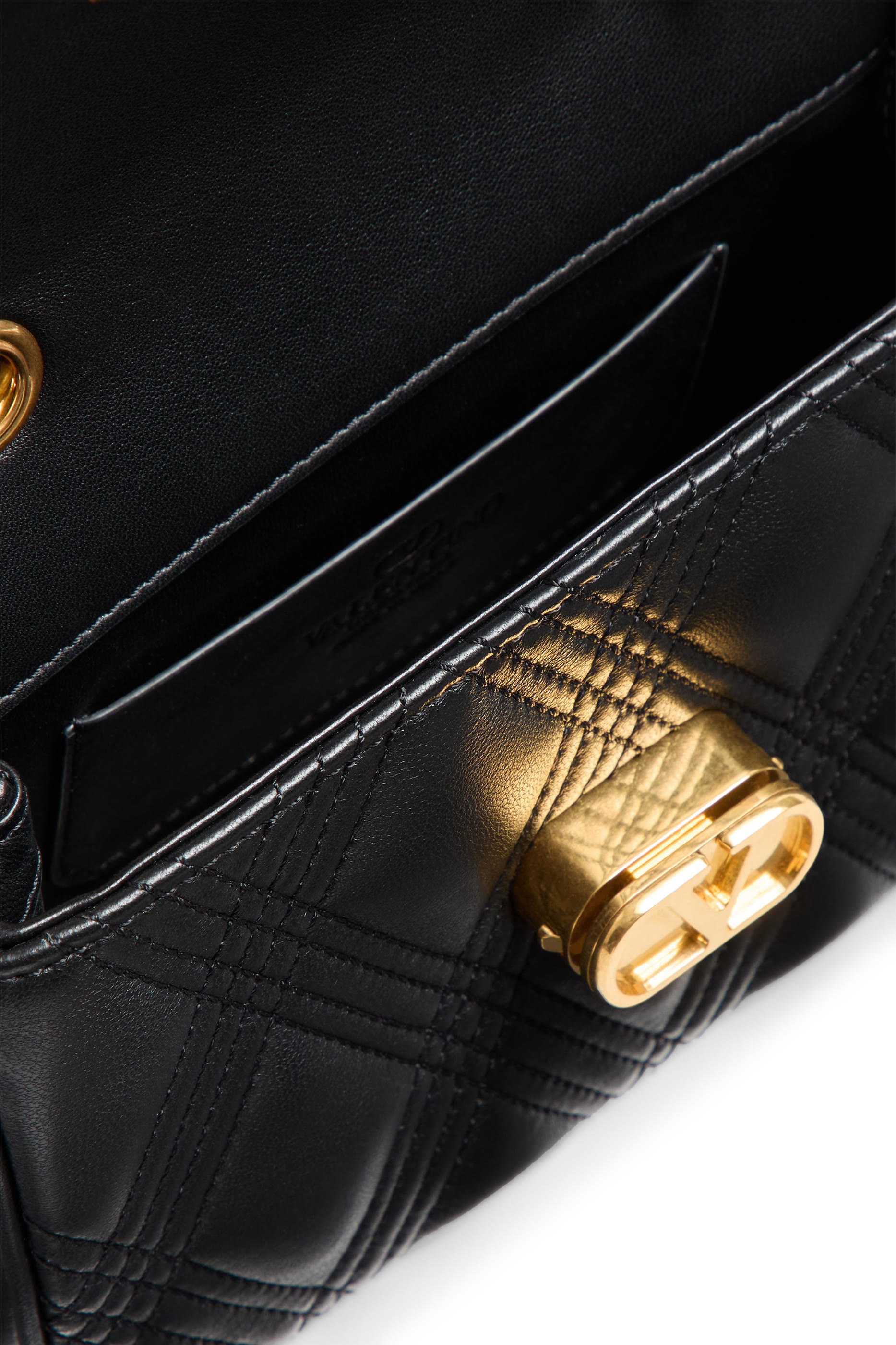 حقيبة كتف صغيرة كويلتي 67