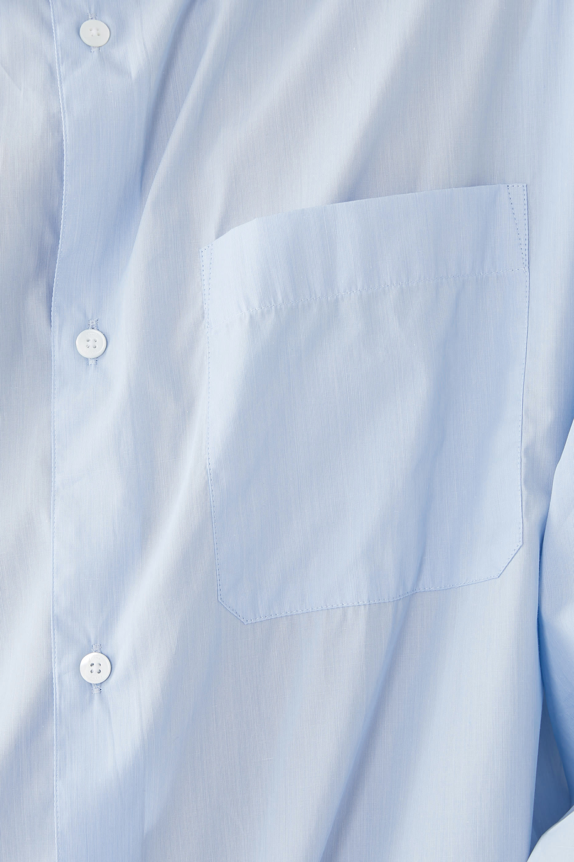 قميص سادة بقصة مريحة