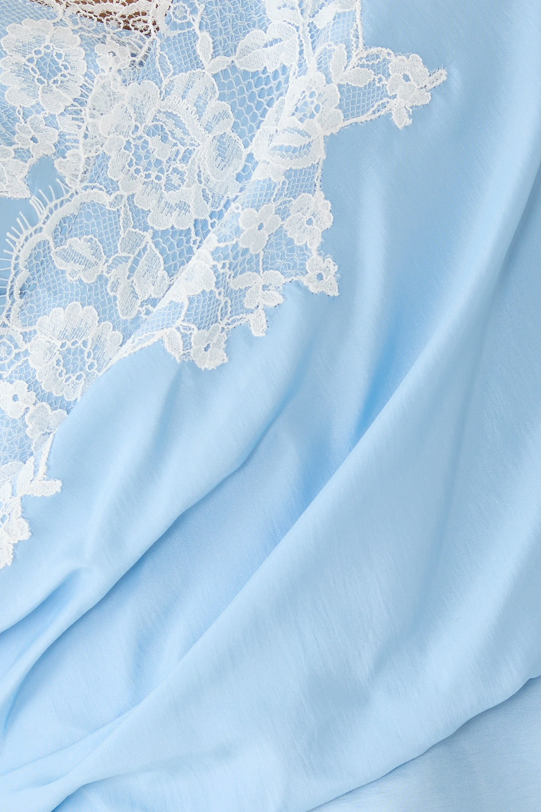 بلوزة هابوتاي بتصميم غير متماثل بلمسة دانتيل