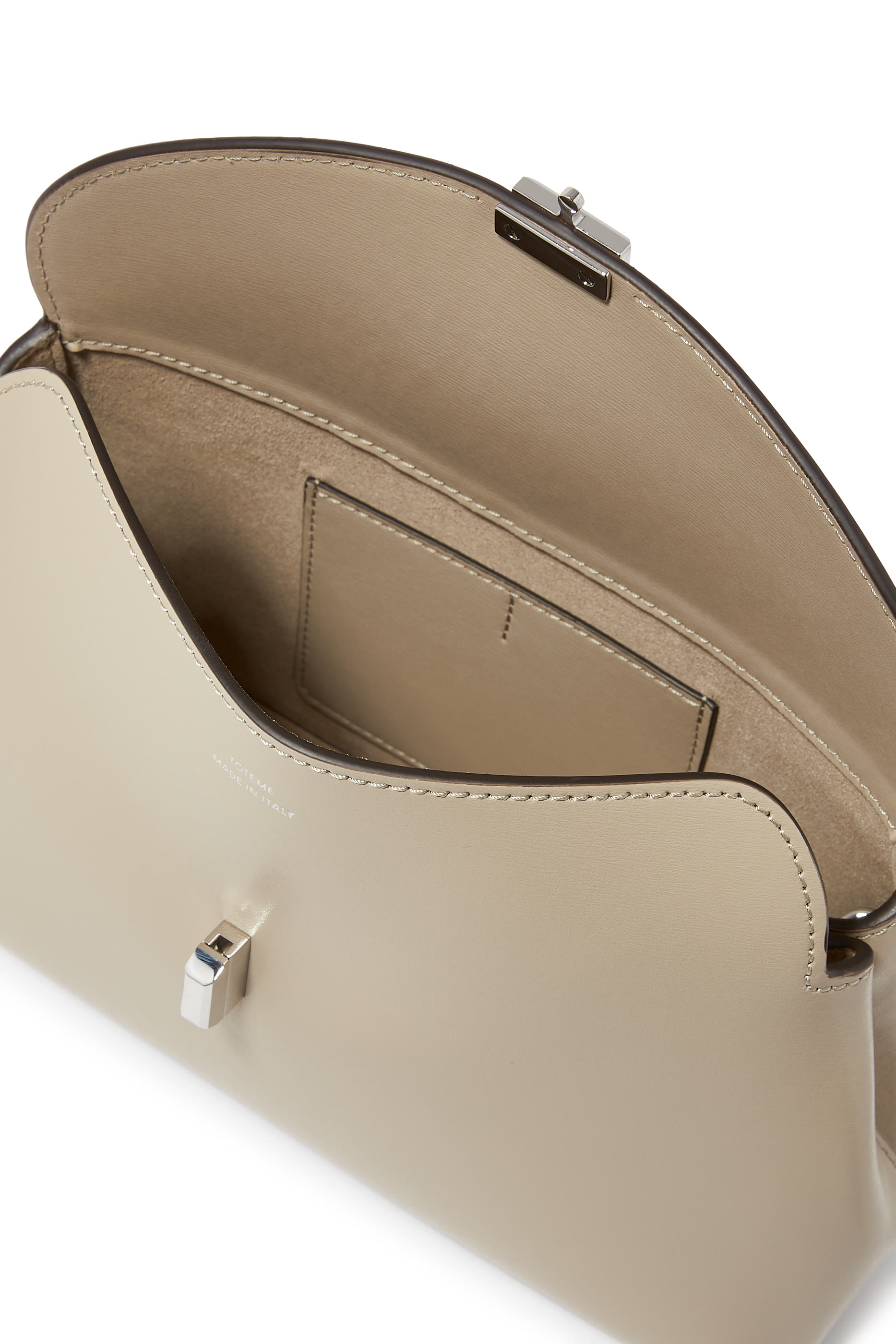 حقيبة كلاتش بقفل على شكل حرف T