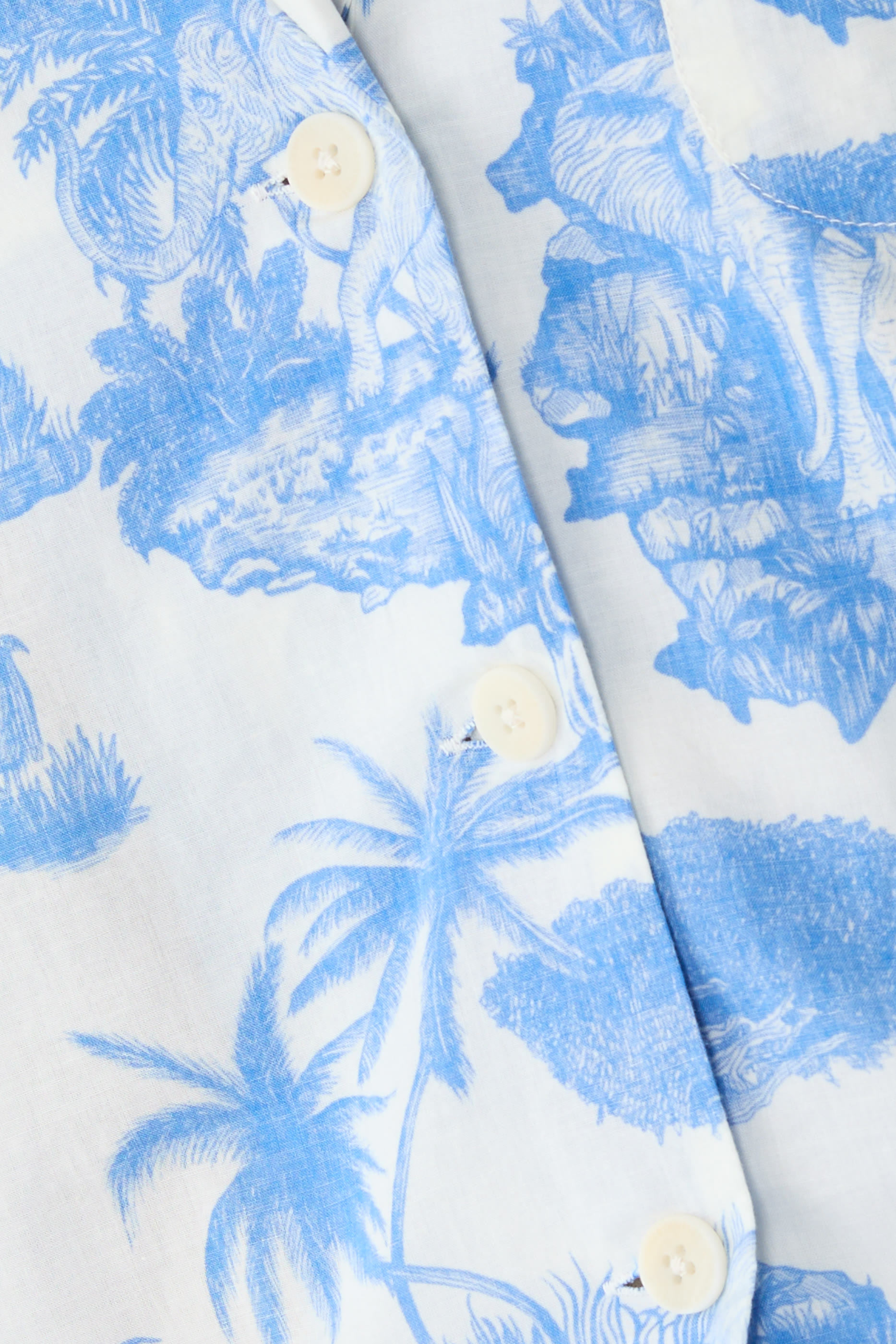 طقم قميص مربعة وبنطال بقصة ساق واسعة بنقشة نمر